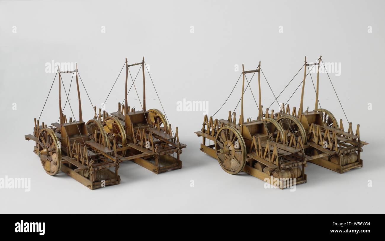 Model of a Life-Saving Cart for Shipwrecks, Two identical models of rescue equipment for rescue operations in the event of shipwreck on a beach, incomplete. Each of the devices consists of two two-wheeled water carts linked with beams, these carts are rotated ninety degrees around their axis, so that the drawbar points straight up. Low compatibles are built around the carts, completely filled with empty barrels, and equipped with seating and walkways at the top. A number of barrels is missing. The wheels have adjustable blades between the spokes. The parts of the carriages are connected in Stock Photo