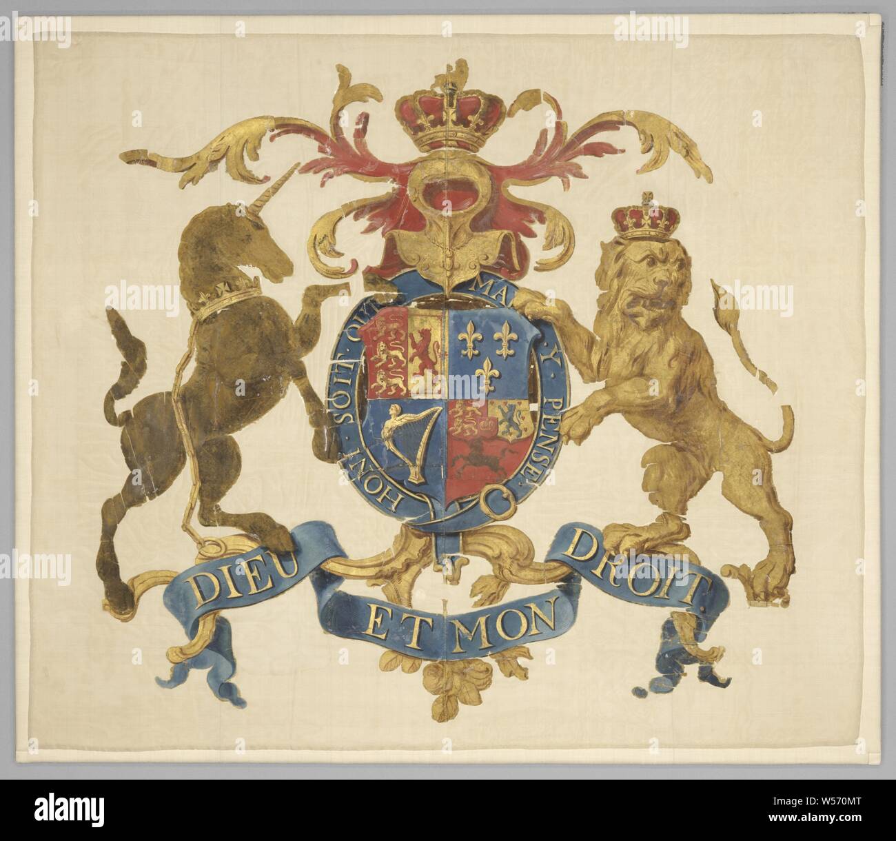 Banner of one of the Scottish regiments, Ecru, in the center the coat of arms of the King of England-Hanover, surrounded by the Order of the Garter (the buckle is on the front and the parading side on the flight side) held by a crowned-looking leopard, and a unicorn with a golden crown around its neck, on which a golden chain depends (or symbol of England and that of Scotland, respectively). Above it a helmet with an open visor, covered with a royal crown. The helmet is surrounded by symmetrical decorative foliage that extends above the wearers. Under the weapon is an asymmetrical cartouche Stock Photo