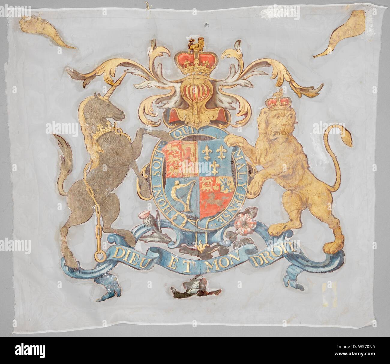 Banner of one of the Scottish regiments, Red, in the center the coat of arms of the king of England-Hannover, surrounded by the Order of the Garter, held by a crowned-looking leopard, and a unicorn with a golden crown around its neck, on which a golden chain depends (symbol of England and Scotland respectively). Above it a helmet with a closed visor, on which a crown with three beaded braces and a lying leopard on it (helmet sign of England). The helmet is surrounded by symmetrical decorative foliage that extends above the wearers. Below the weapon is a symmetrical cartouche Stock Photo