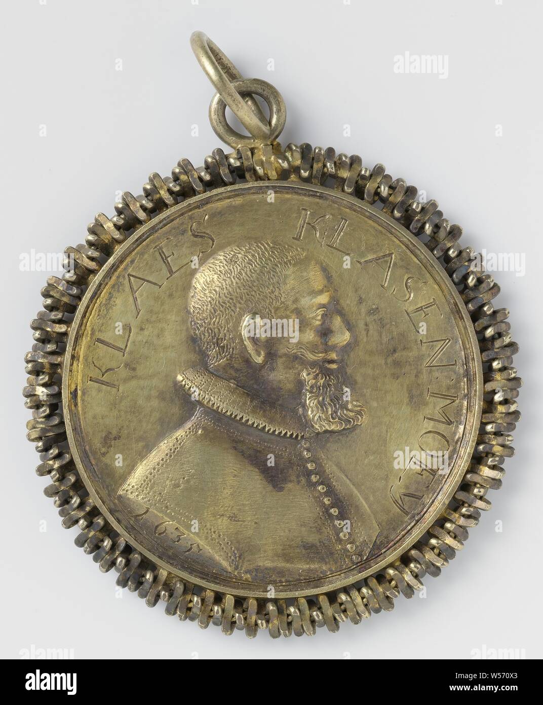 Klaes Klasen Moey, Gold-plated silver medal on support eye and support ring in cut-away edge. Front: portrait and profile of Klaes Klasen Moey in sailor costume and 1635. On the reverse a three-mast in the high seas with inscription: CLAESIEN CORNELIS.M., anonymous, 1635, silver (metal), engraving, d 9.3 cm × d 8.1 cm × d 7.2 cm × d 6 cm × w 72.68 Stock Photo