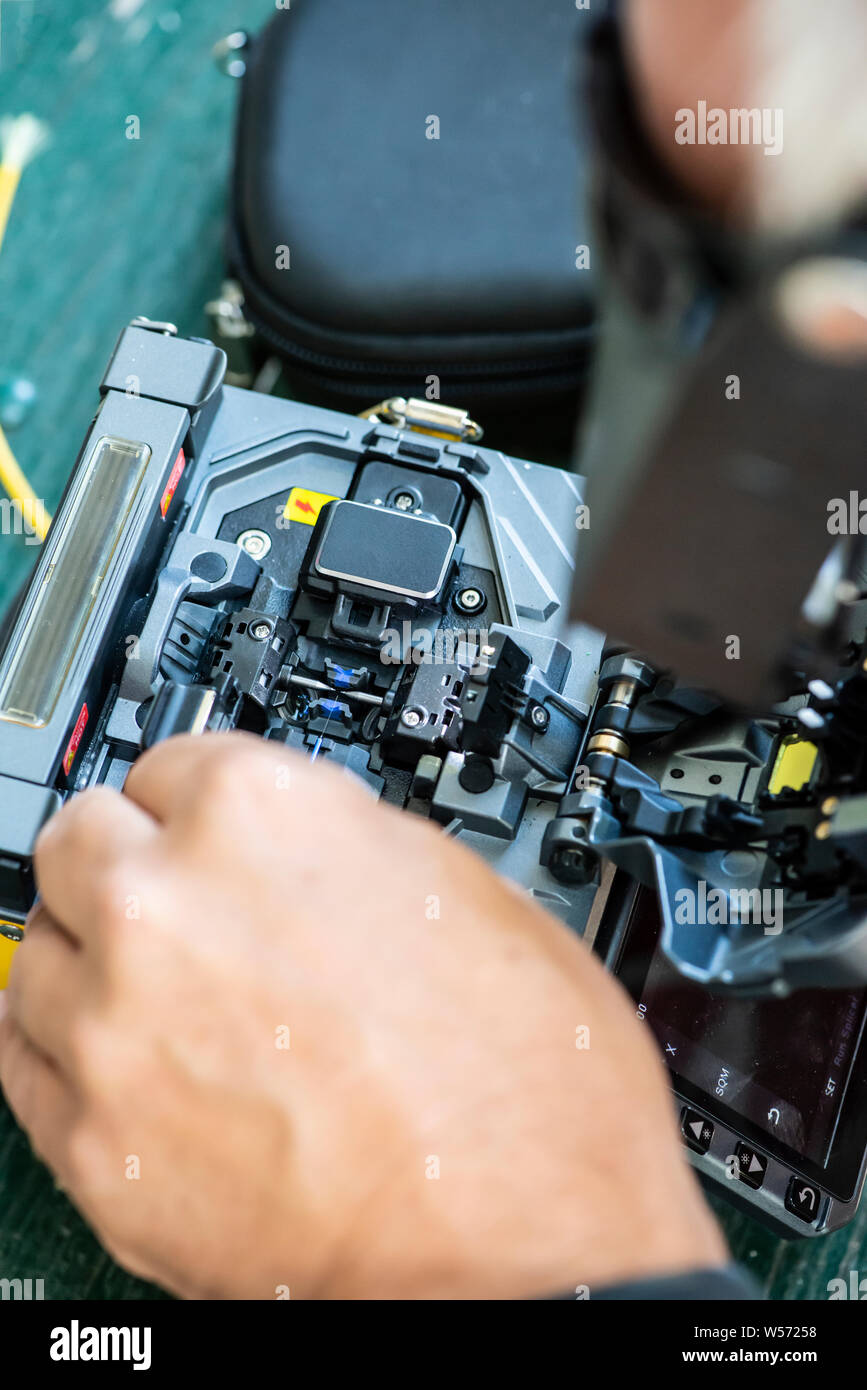 Device for mounting optical cable. Optical Technology concept