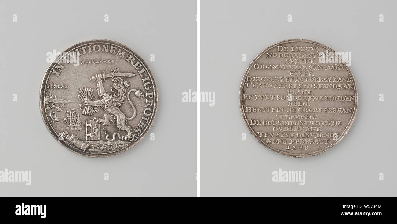 Landing of William III at Torbay, Silver Medal. Front: lion with wreathed sword and bundle of arrows trampled with one claw snake and rests with the other on the Bible, in the background landing within an inscription. Reverse: inscription, Torbay, Devon, England, William III (Prince of Orange and King of England, Scotland and Ireland), anonymous, Netherlands, 1688, silver (metal), founding, d 4.3 cm × w 27.67 Stock Photo