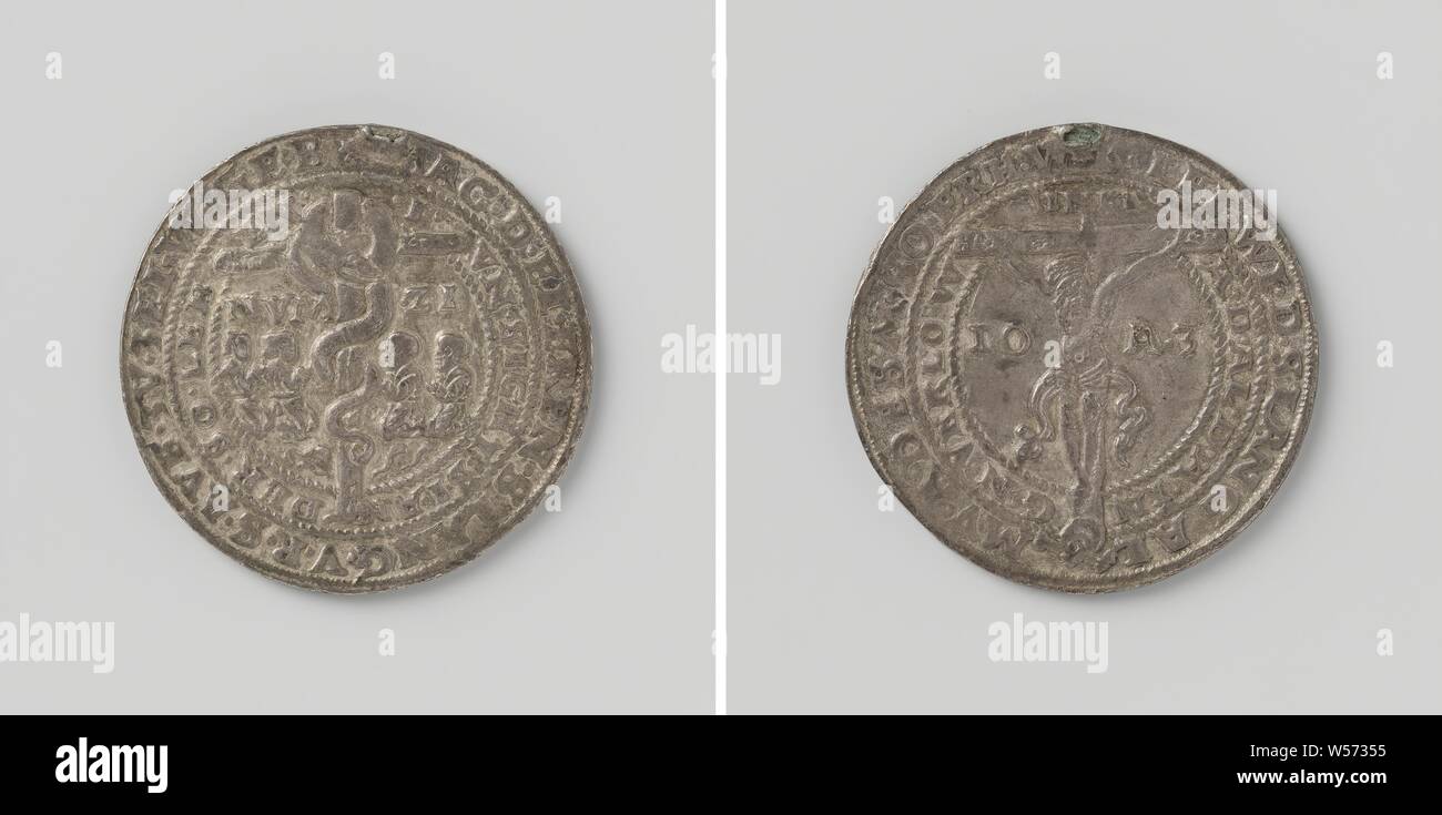 Plague in Germany, Silver medal with broken eye. Obverse: copper serpent on cross, around Israelites kneeling in a two-line text. Reverse: Christ on the cross within a two-line circumscription, Germany, anonymous, 1528, silver (metal), striking (metalworking), d 3.6 cm × w 14.64 Stock Photo