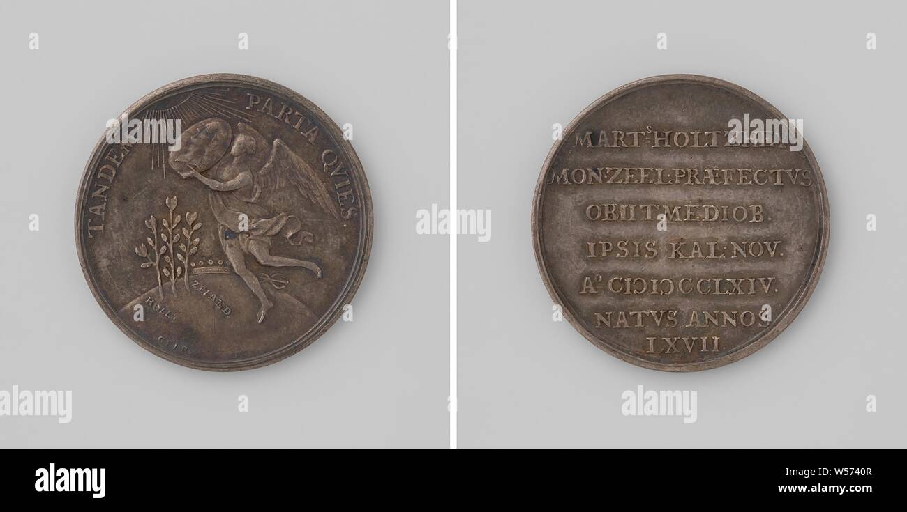 Death of Martinus Holtzhey, mint master of Zeeland, Silver Medal. Front: angel flies with a portrait of deceased mint master skyward, illuminated by heavenly light, below that globe with crown, Mercury staff and three olive branches within an inscription. Reverse: inscription, anonymous, Netherlands, 1764, silver (metal), striking (metalworking), d 3 cm × w 8.73 Stock Photo