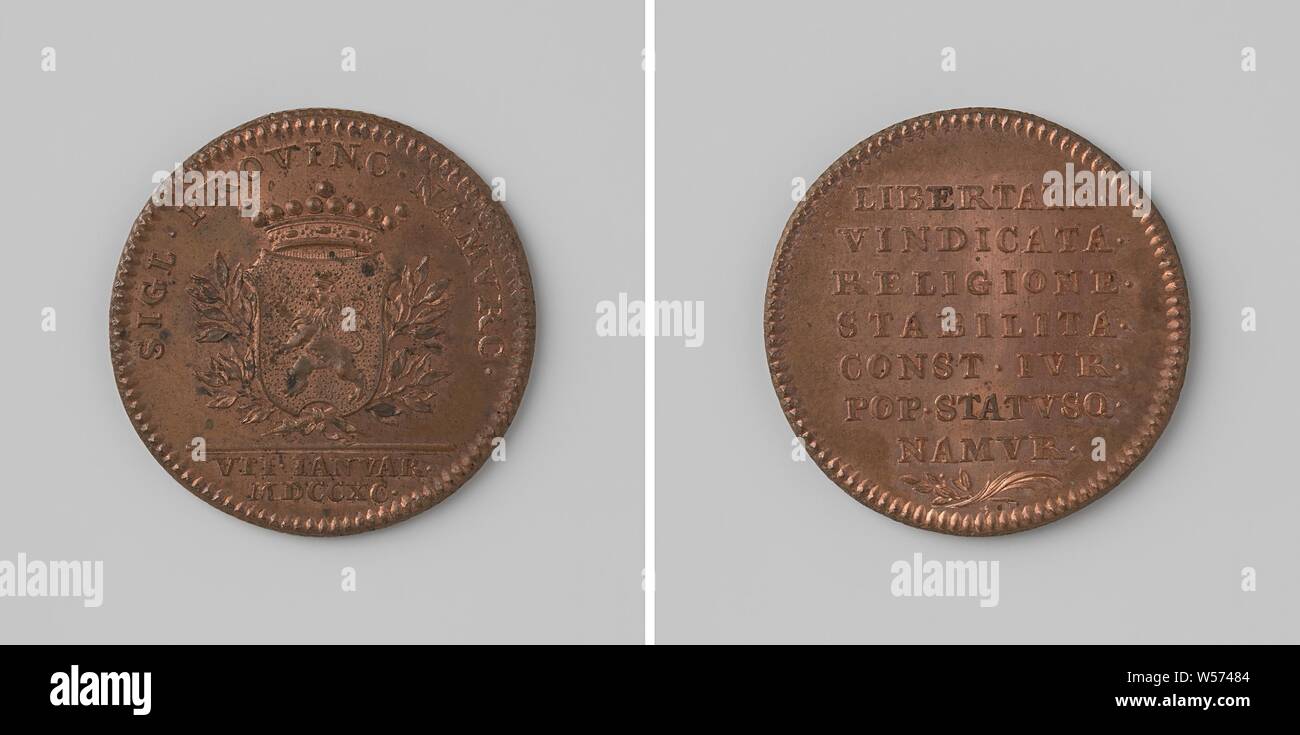 Names declared free, Copper Medal. Obverse: crowned coat of arms amidst olive branches within an inscription, cut-off: date. Reverse: inscription above crossed palm and olive branch, Namur, anonymous, Namen, 1790, copper (metal), striking (metalworking), d 3.3 cm × w 13.91 Stock Photo