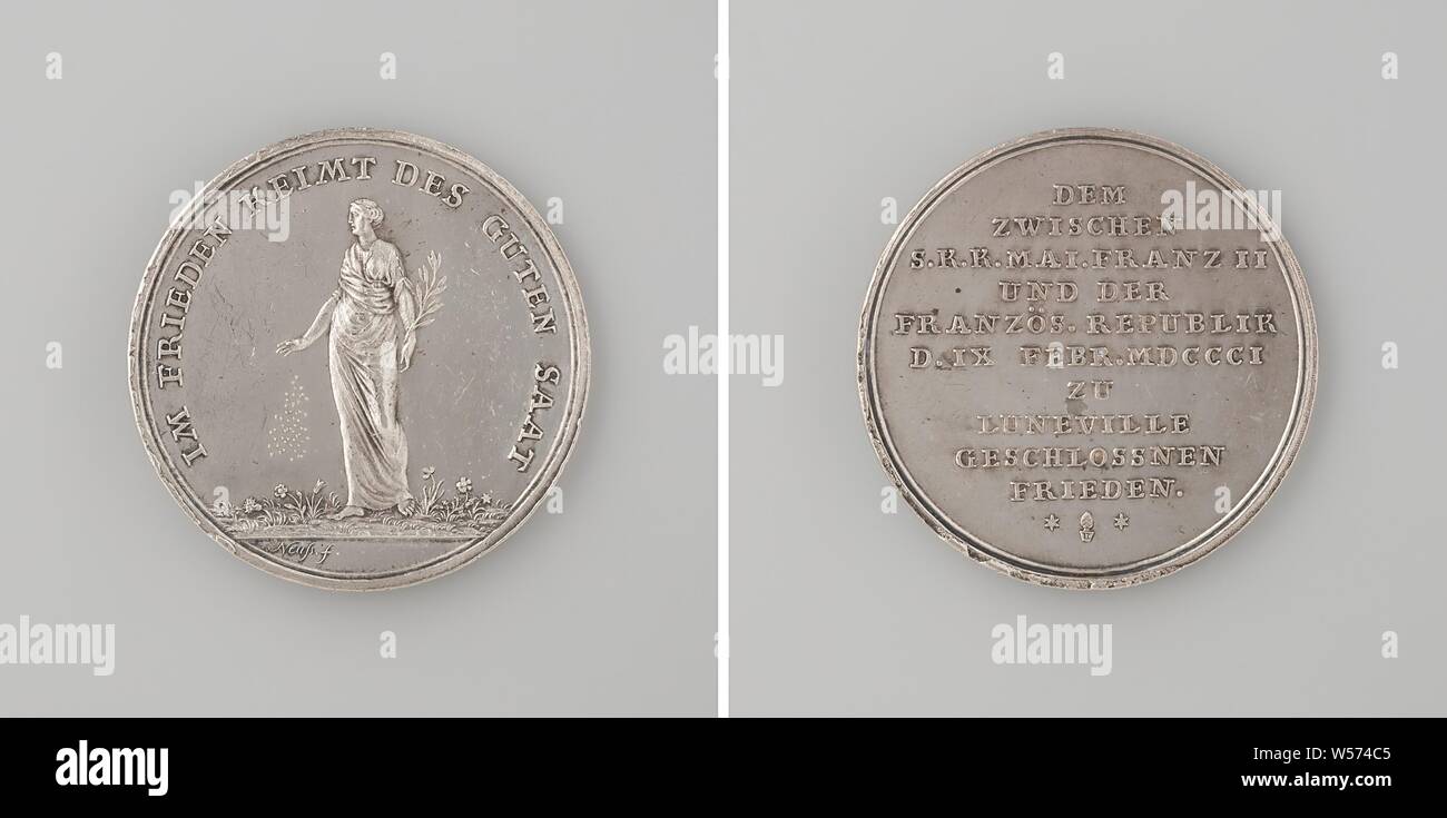 Luneville Peace, Silver Medal. Obverse: Peace, depicted as a woman with an olive branch in hand, scatters seed over a field with flowers within an inscription, cut: signature. Reverse: inscription, Lunéville, French II (Roman-German emperor), Napoleon I Bonaparte (French emperor), Johann Jakob Neuss (der Jüngere), Augsburg, 1801, silver (metal), striking (metalworking), d 3.1 cm × w 11.24 Stock Photo