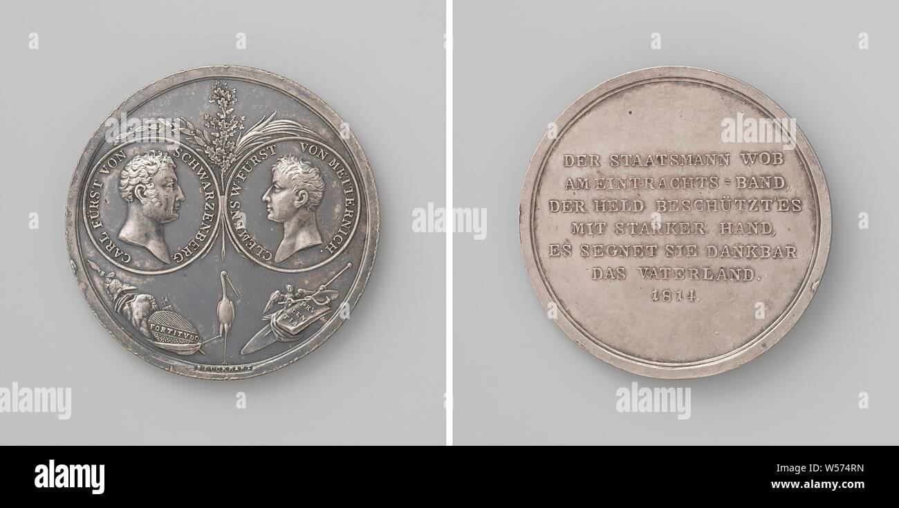 First peace of Paris between France and the Allies, in honor of Karel Philip van Schwarzenberg and Clemens, Prince Metternich, Silver Medal. Front: two portrait medallions with inlays between palm, olive and oak branches, below that a victory sign, stork and ship's rudder, on which lies a book and an owl sits, holding a mirror in claws around which snake snakes. Reverse: inscription, Paris, Karl Philipp zu Schwarzenberg, Klemens Wenzel Lothar Fürst von Metternich, Franz Stuckhart, 1814, silver (metal), striking (metalworking), d 4.3 cm × w 22.55 Stock Photo