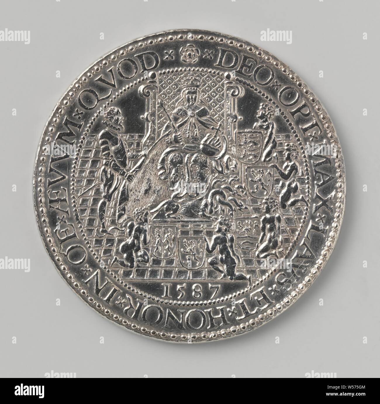 Help from Elisabeth, queen of England to the northern Netherlands, Silver  Medal. Obverse: Elisabeth with crown, scepter and apple of apple sitting on  throne trampling many-headed monster, next to her is Leicester,