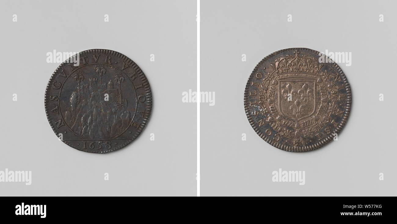 Capture of Montmedy, counted token charged by order of the Conseil d'Etat, Silver Medal. Front: view of Montmedy on mountain, above city: three lilies within a circle, cut: year. Reverse: crowned coat of arms, hanging with the orders of St. Michel and of the Holy Spirit within a cover, Montmédy, anonymous, Paris, 1658, silver (metal), striking (metalworking), d 2.7 cm × w 5.33 Stock Photo