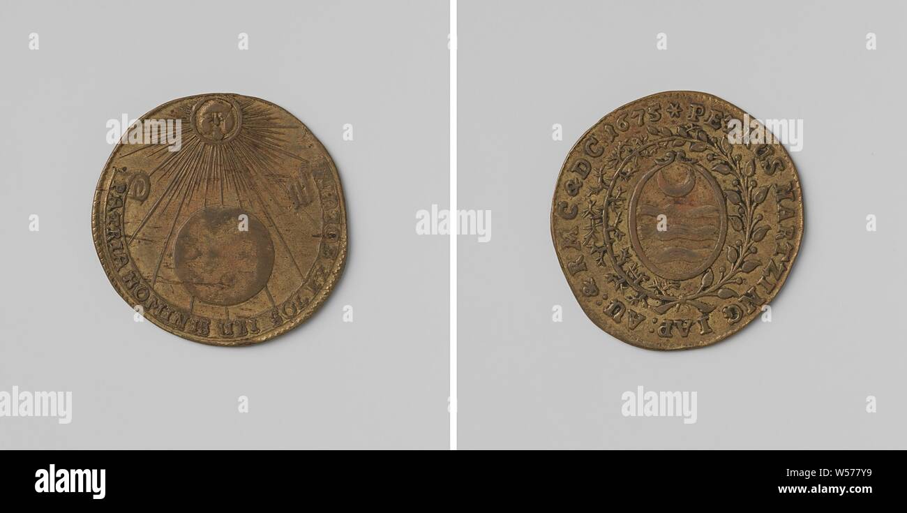 Petrus Hartzing, Copper Medal. Front: globe illuminated by radiant sun within a wrap around pennant. Reverse: oval coat of arms inside leaves and scroll tied together, wreath, anonymous, 1675, copper (metal), striking (metalworking), d 2.7 cm × w 3.71 Stock Photo