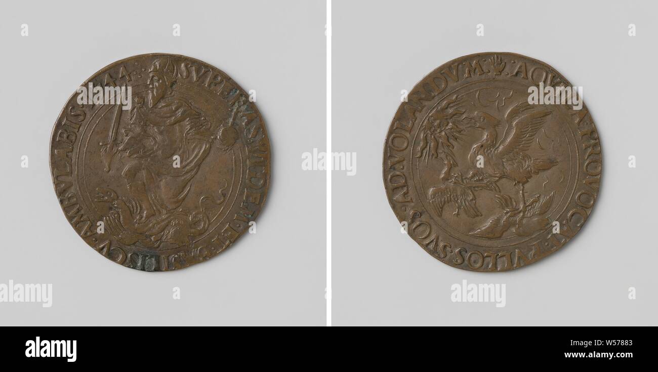 Charles V, German Emperor, is preparing for the war against France and the Turks, Copper Medal. Obverse: portrait of Charles V with crown, apple of the kingdom in left and sword in right hand, standing on the ground snake Aspis and monster Basiliscus inside an inscription. Reverse: eagle, accompanied by two young ones, looking up at the radiant sun within a circle, Charles V of Habsburg (German Emperor and King of Spain), anonymous, Antwerp, 1544, copper (metal), striking (metalworking), d 2.8 cm × w 4.64 Stock Photo