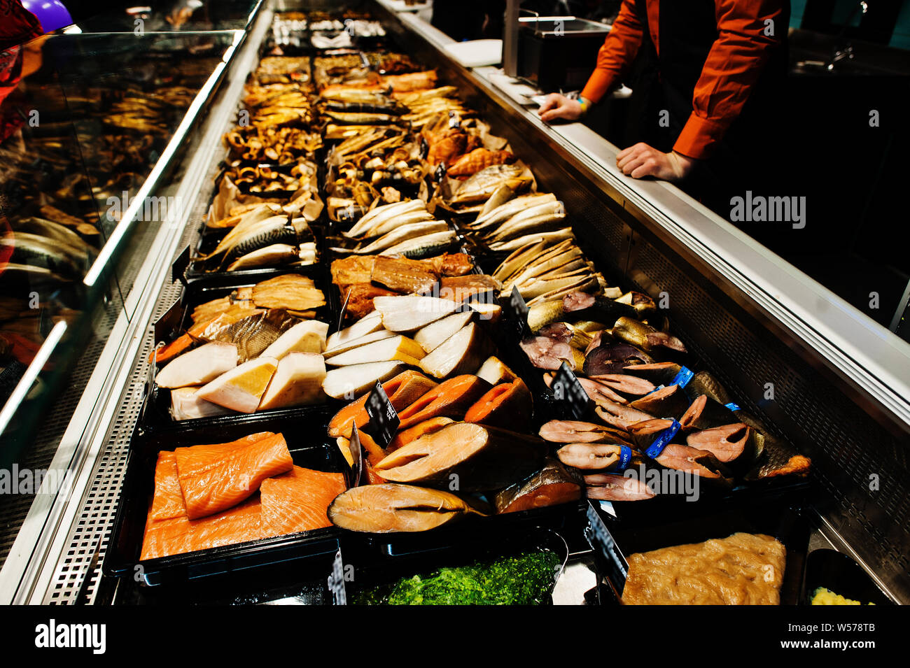 Various smoked fish for sale at supermarket. Stock Photo