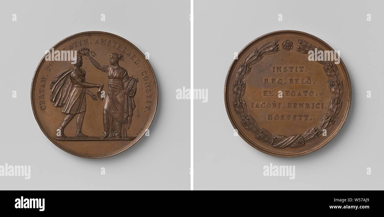 Bequest from J.H. Hoeufft to promote the practice of Latin poetry, Bronze Medal. Obverse: woman in antique clothing, representing Muze, holding a winch in left hand and crowning laurel wreath in outstretched, raised right hand, a man approaching her, offering a roll of paper within a wrap. Reverse: inscription inside wreath of olive branches, Amsterdam, Jacob Hendrik Hoeufft (1756-1843), David van der Kellen (1804-1879), Utrecht, 1843 - 1844, bronze (metal), striking (metalworking), d 4.1 cm × w 351 Stock Photo