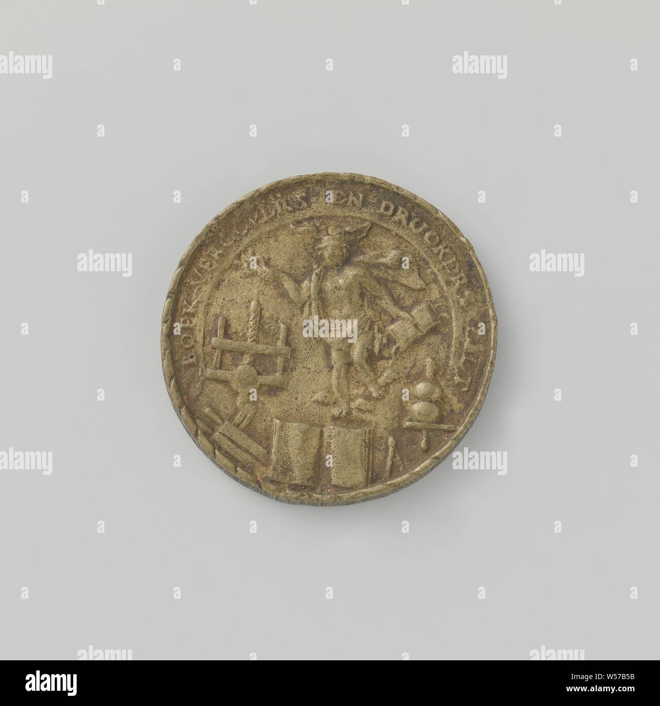 Gouda, fire spray token with no. 11, Brass token. Obverse: crowned