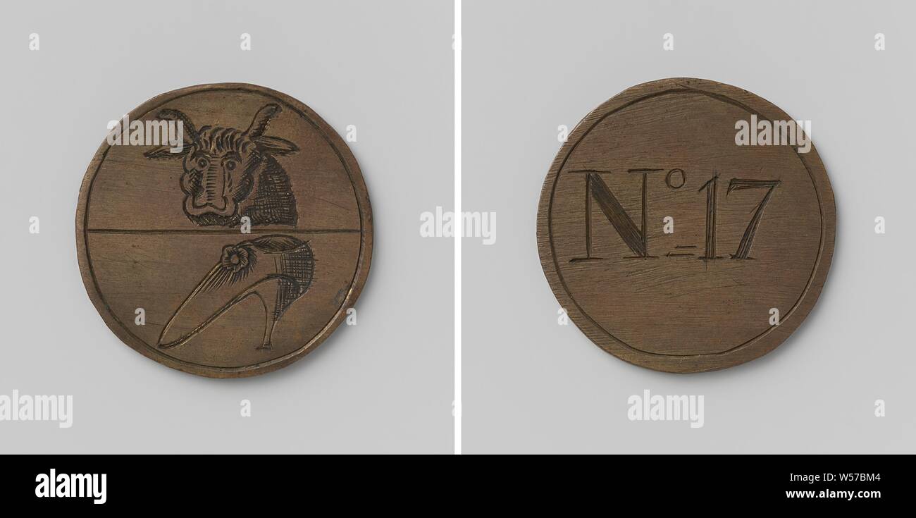 Skin buyers, tanner and shoemakers' guild of Amsterdam, guild token with no. 17, Brass token. Front: flat horizontally divided in two, above: ox head, below: shoe. Reverse: number 17, Amsterdam, anonymous, 1664, brass (alloy), engraving, d 3.4 cm × w 13.16 Stock Photo