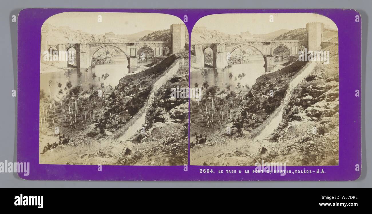 View of the Puente de San Martín in Toledo Le Tage and le Pont St. Martin, Tolede (title on object), landscape with bridge, overpass or aqueduct, Puente de San Martín, Jean Montaigue Andrieu (mentioned on object), Toledo, c. 1860 - in or before 1876, cardboard, photographic paper, albumen print, h 85 mm × w 170 mm Stock Photo