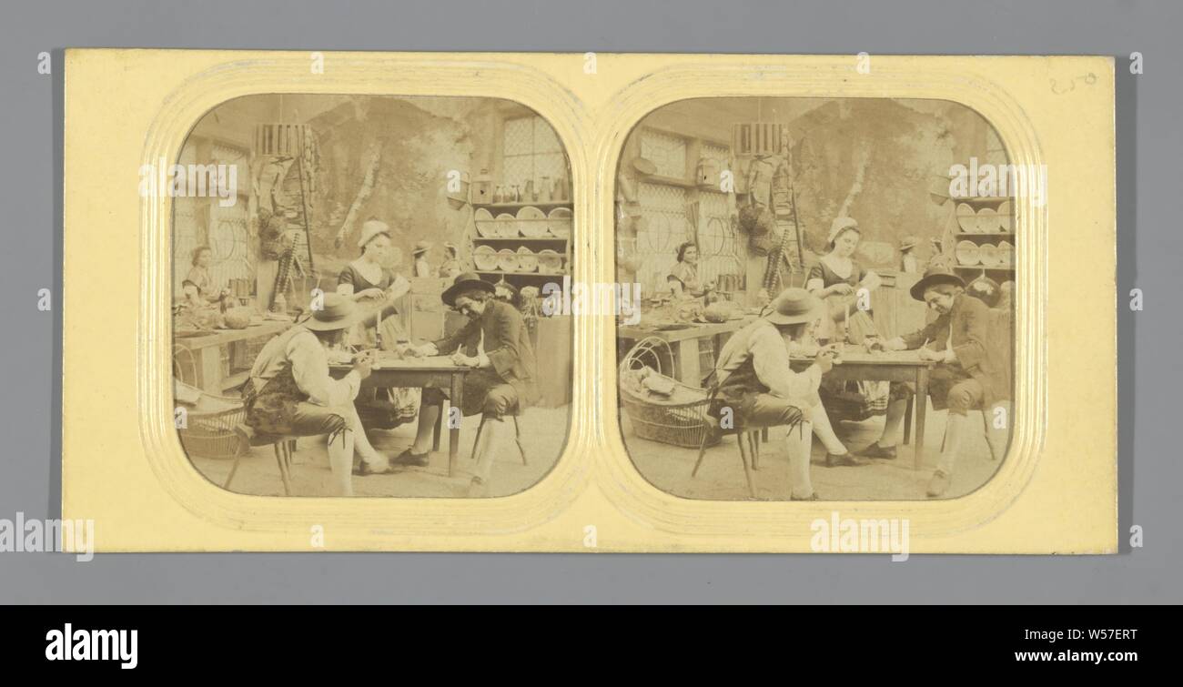 Scene in a pub: two men playing dice at the table, anonymous, 1860 - 1880 Stock Photo