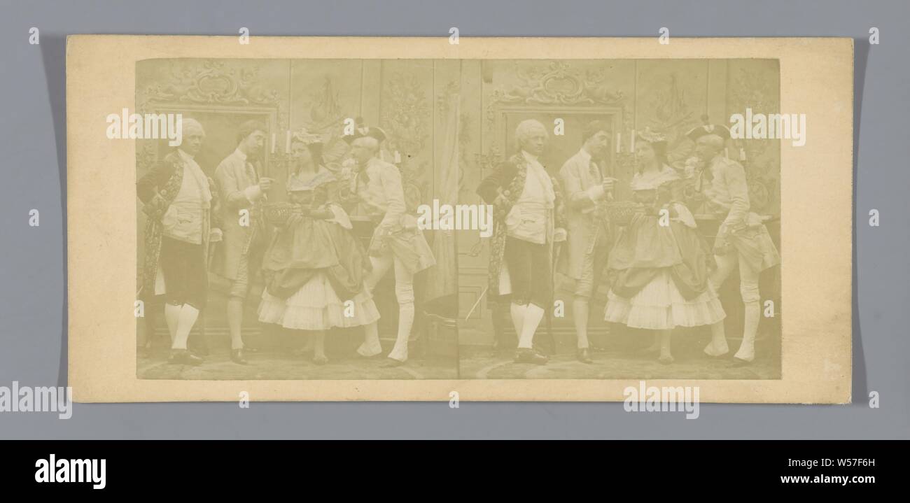 Theatrical representation of a company in historical costumes, historical costume, Europe, anonymous, c. 1850 - c. 1880, cardboard, photographic paper, albumen print, h 85 mm × w 170 mm Stock Photo