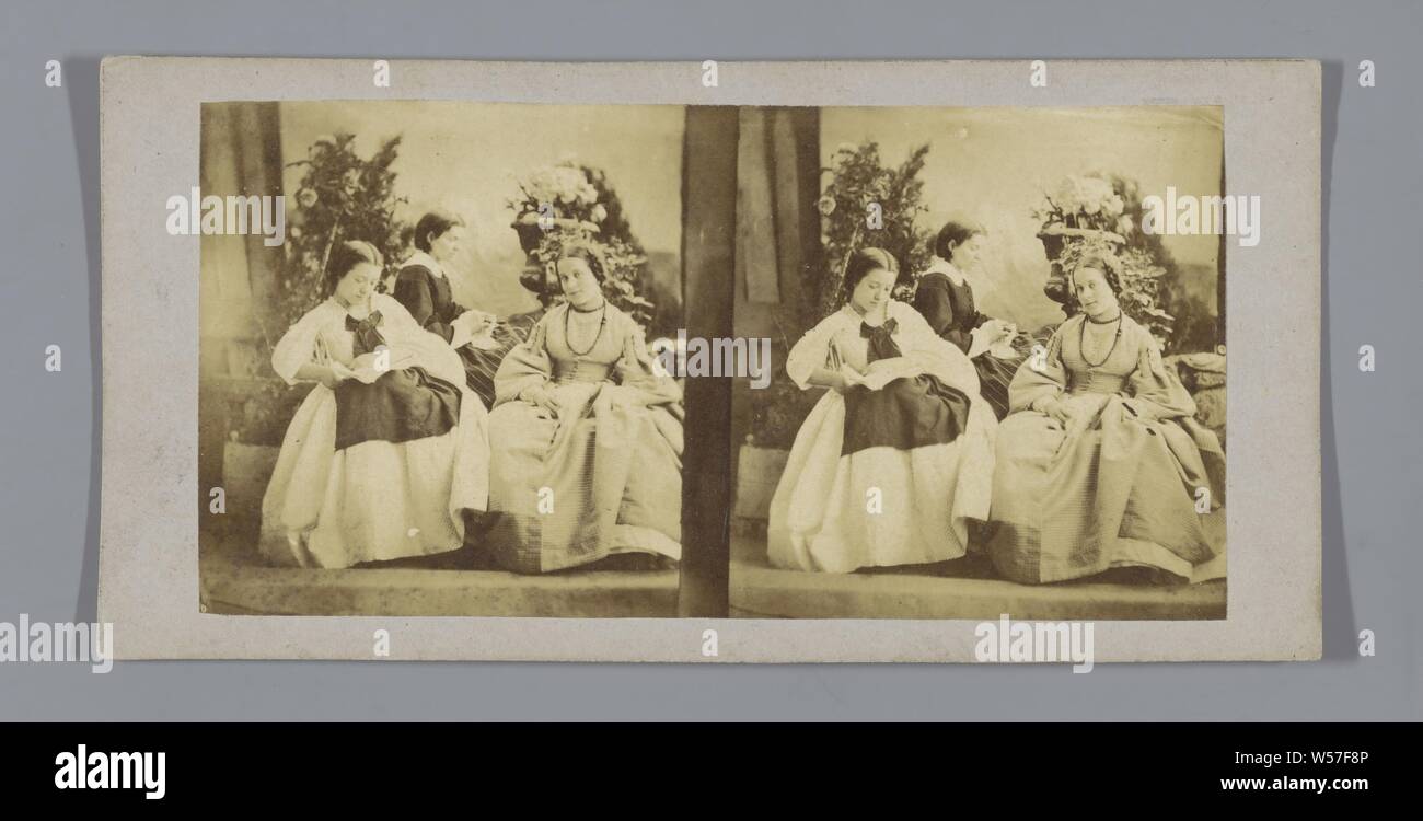 Three sitting women in front of flower pots, garden vase, sitting figure, Europe, anonymous, c. 1850 - c. 1880, cardboard, photographic paper, albumen print, h 85 mm × w 170 mm Stock Photo