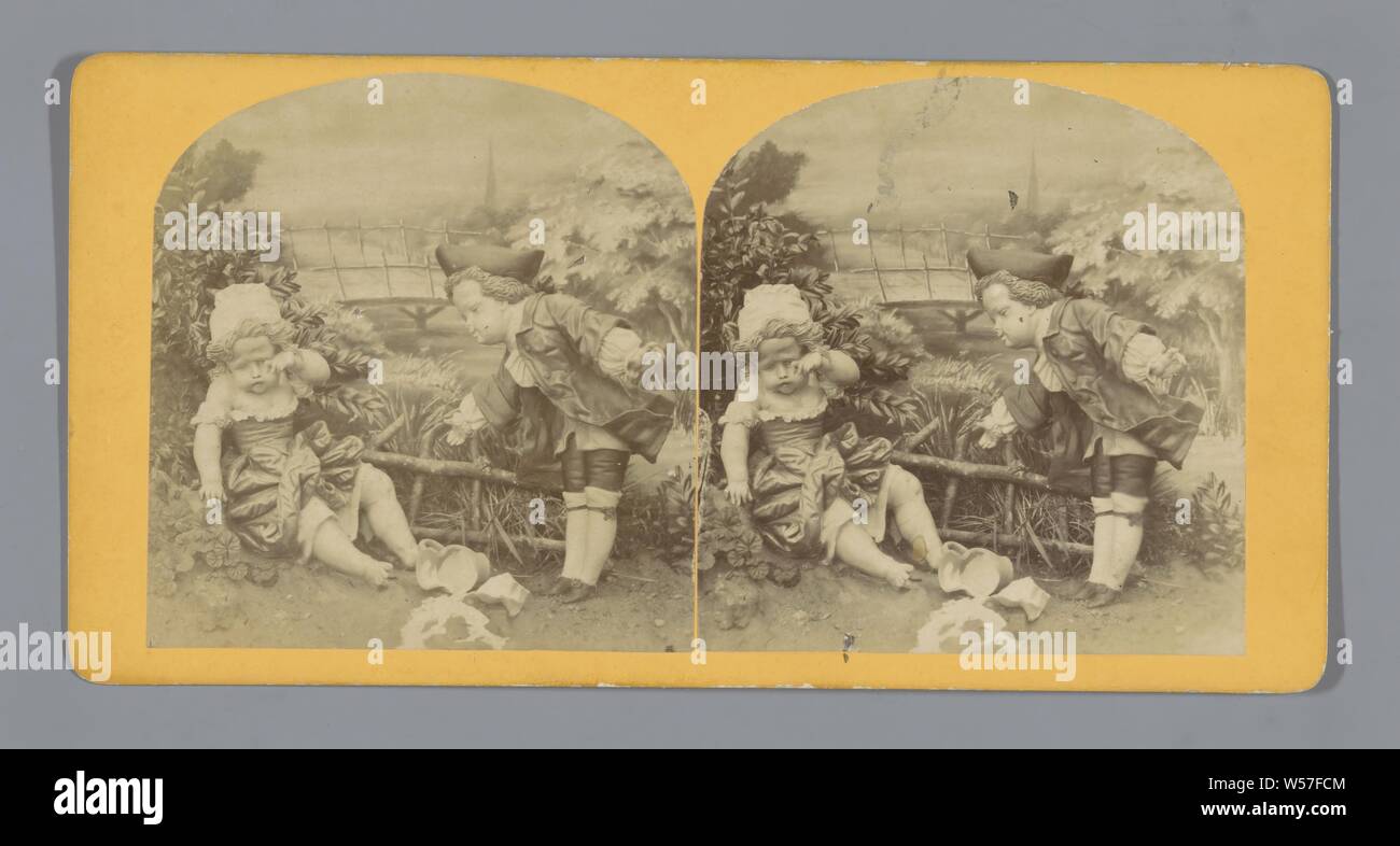 Staging with two dolls, representing a crying girl with a broken can and a boy, (playing with) dolls, set, scenery, stage, Europe, anonymous, c. 1850 - c. 1880, cardboard, photographic paper, albumen print, h 85 mm × w 170 mm Stock Photo