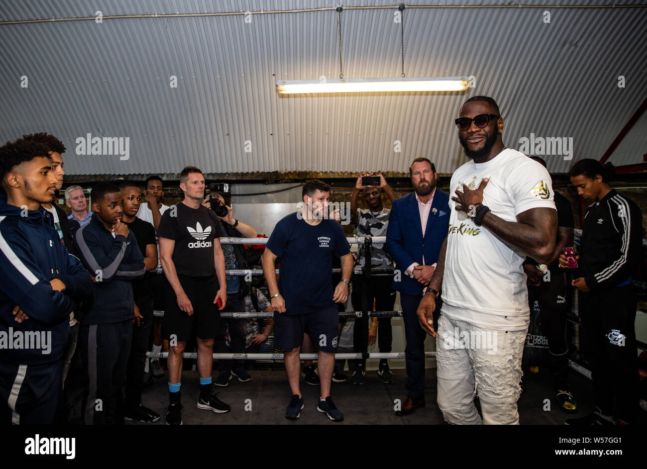 Deontay Wilder Talking With Young Boxers During The Photocall At Fitzroy Lodge Gym London Stock Photo Alamy