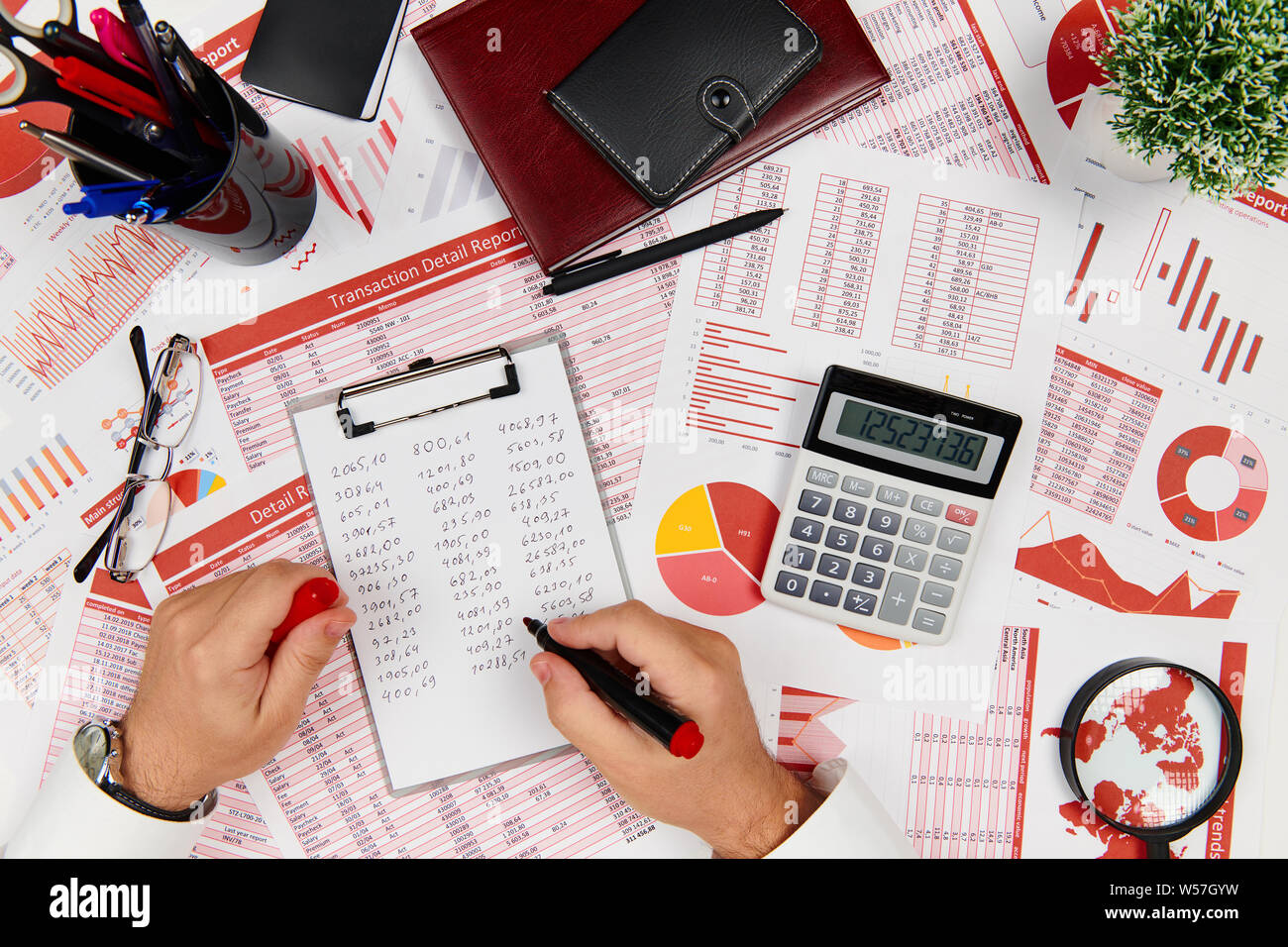 Business reports, data tables and charts directly above view of