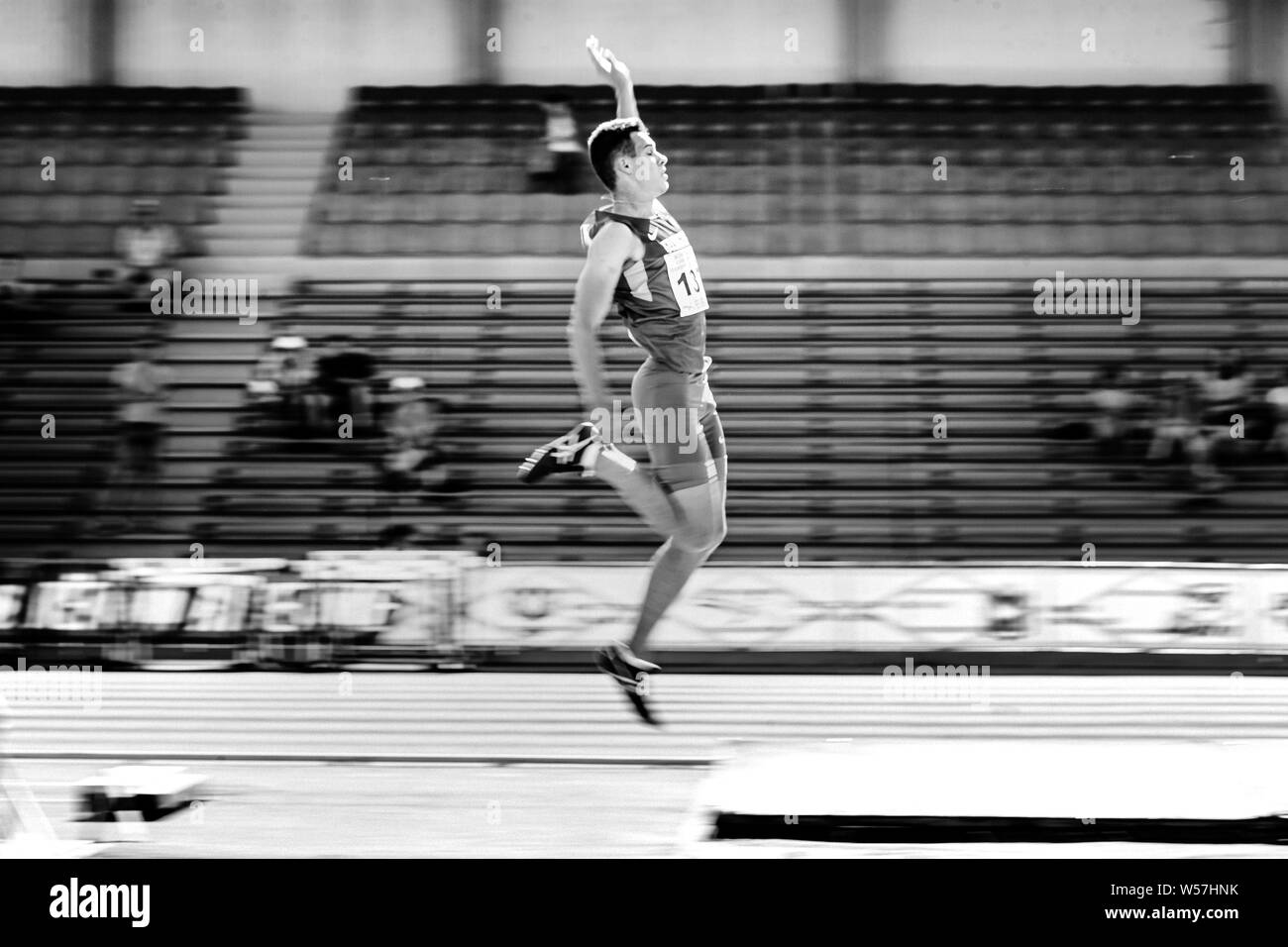 Chelyabinsk, Russia - July 12, 2019: male athlete long jump motion blur during Championship in athletics in memory of Georgy Necheukhin Stock Photo