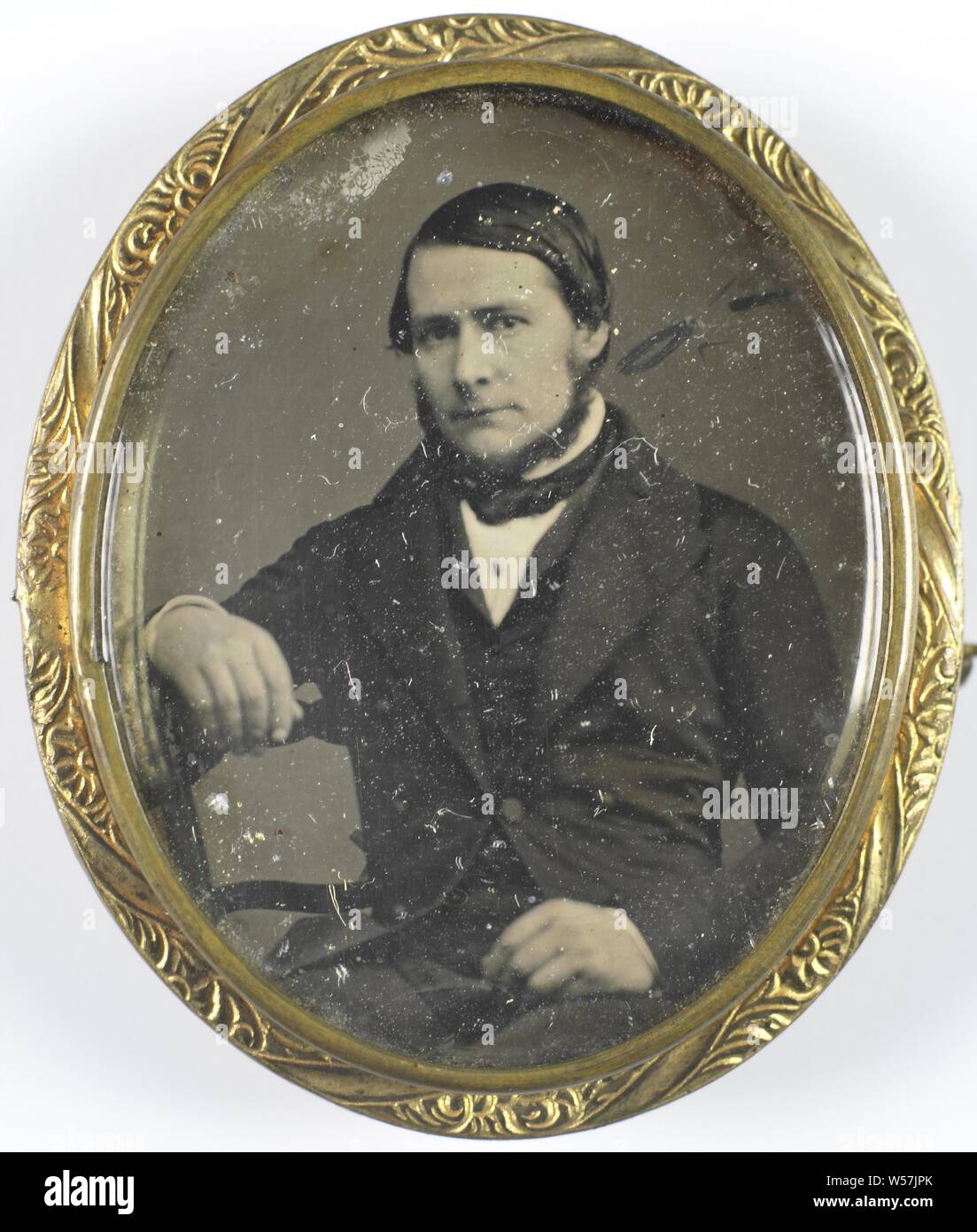 Portrait of an unknown man, historical persons, adult man, anonymous, 1840 - 1860, copper (metal), glass, metal, h 44 mm × w 35 mm h 50 mm × w 42 mm × t 3 mm Stock Photo