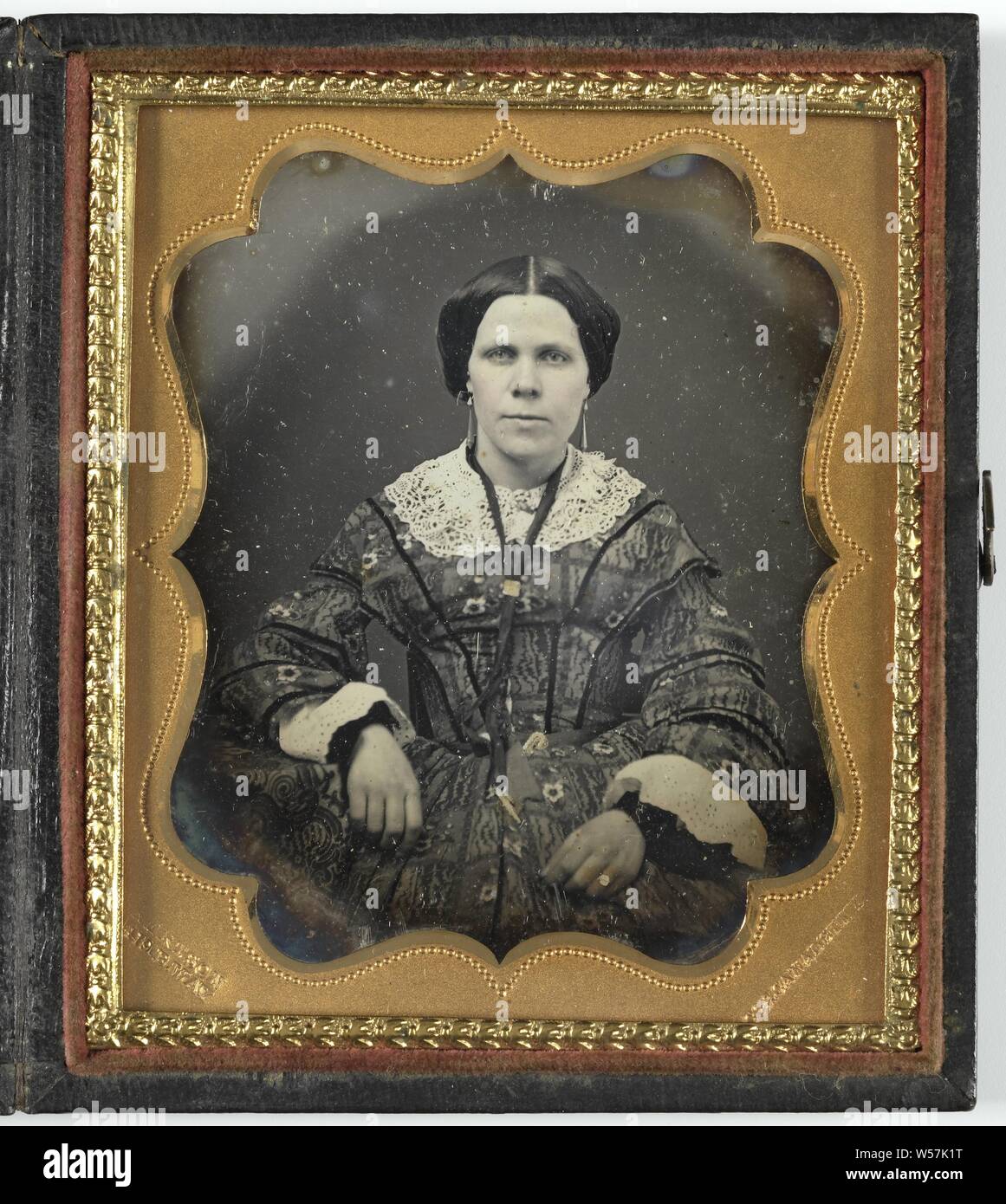 Portrait of an unknown woman, historical persons, adult woman, M. Kertson, 1840 - 1860, copper (metal), glass, leather, velvet (fabric weave), h 68 mm × w 50 mm h 93 mm × w 81 mm × t 13 mm Stock Photo