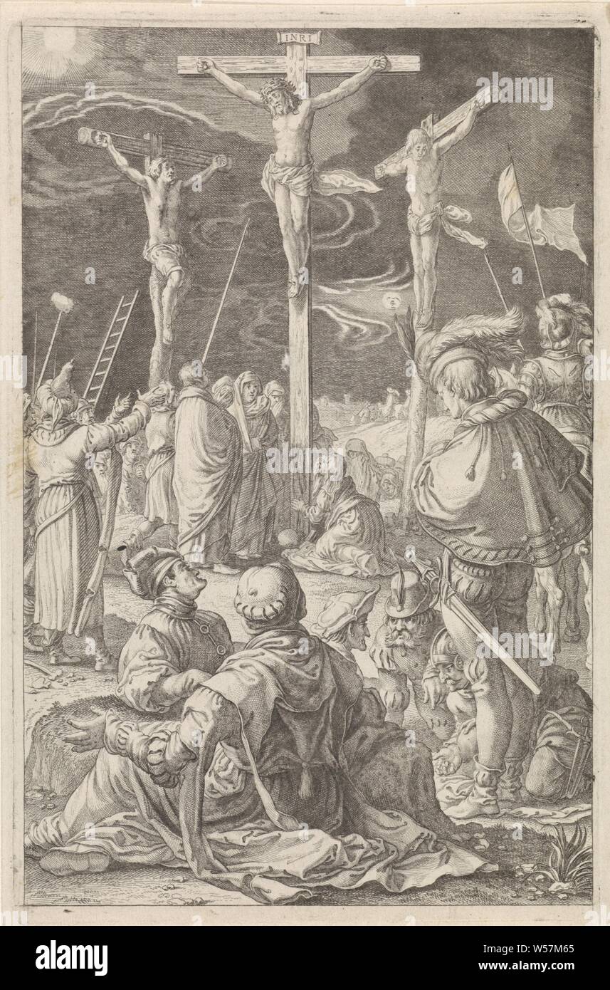 Crucifixion De Passie (series title), Christ on the cross between the two other crucifixions. At the foot of the cross among others the three Marys and Longinus with his lance. In the foreground the soldiers who dice for his clothes, the crucifixion of Christ: Christ's death on the cross, Calvary (Matthew 27: 45-58, Mark 15: 33-45, Luke 23: 44-52, John 19: 25-38), anonymous, Netherlands (possibly), 1596 - 1667, paper, engraving, h 200 mm × w 130 mm Stock Photo