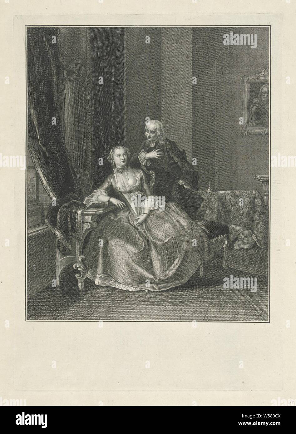 Tartuffe or the hypocritical impostor, Interieur with a lady, Elmire and a gentleman, Tartuffe. In the background is a second man, Orgon, under a table. Scene from the play Tartuffe van Molière from 1664: the lady, Elmire, dressed in a frock with deep neckline sits on a chair, her right arm leaning on a thick book on a table. Behind her is the character Tartuffe, who tries to seduce her. In the background you can see how her husband Orgon watches the two under a table. Through this list, Elmire convinces her husband that his blind faith in Tartuffe, a religious fanatic, is being abused Stock Photo