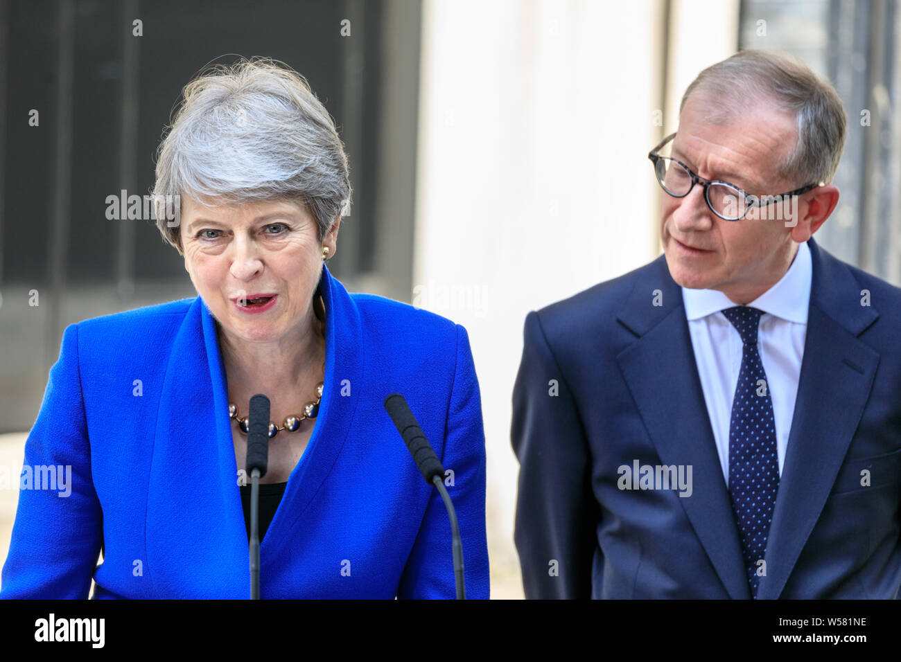 British Prime Minister Theresa May makes her farewell speech with husband Philip May by her side outside 10 Downing Street before her resignation that Stock Photo