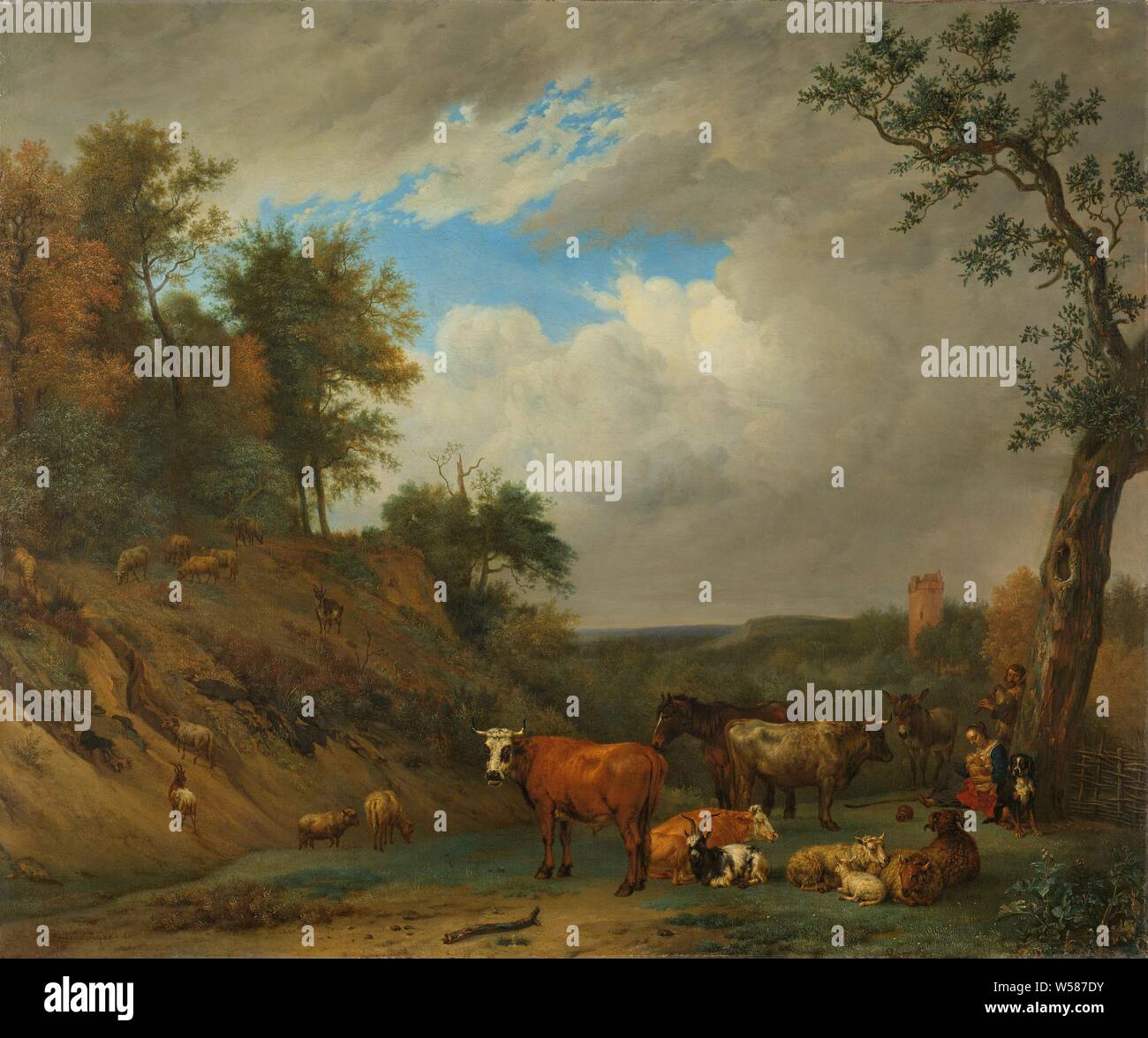 Herdsmen with their cattle, Herders with their cattle. Under an old tree a woman is breastfeeding her child, behind her a shepherd with a bagpipe. A dog is sitting by the tree. Cows, sheep, goats, a donkey and a horse are grazing and resting in front of them and on the left of a hill., Paulus Potter (after), 1651, canvas, oil paint (paint), painting, h 81 cm × w 97.5 cm d 9.5 cm Stock Photo