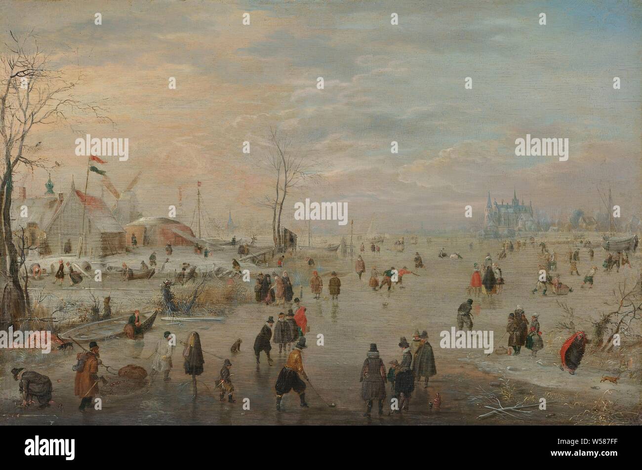 Enjoying the Ice, Ice cream. On a frozen water near a castle, numerous figures enjoy themselves with skates and kolf games, skates (winter sports), 'kolf' on the ice, winter landscape, landscape symbolizing winter (the four seasons of the year), castle, Hendrick Avercamp (mentioned on object), c. 1615 - c. 1620, panel, oil paint (paint), support: h 25.4 cm × w 37.5 cm Stock Photo