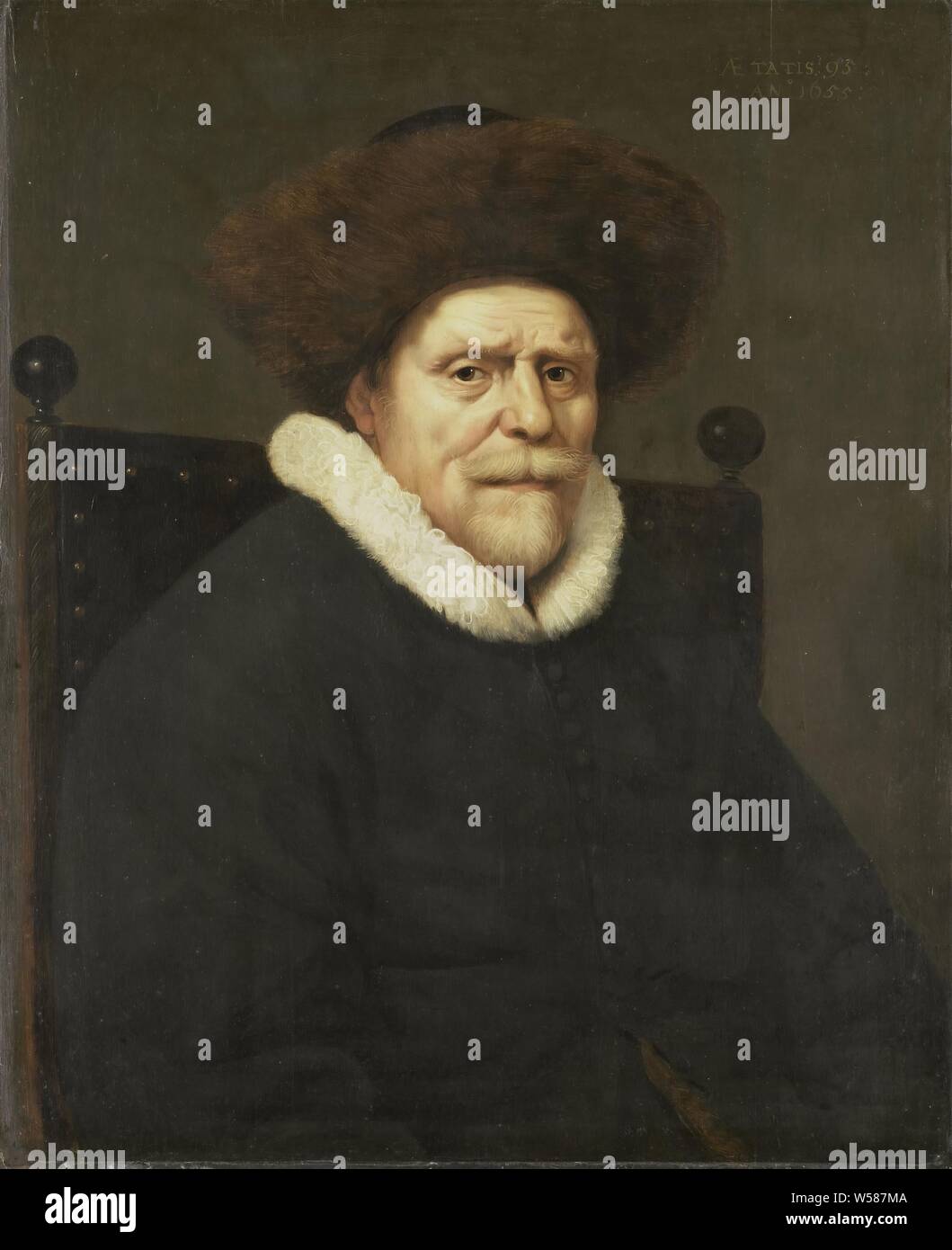 Portrait of a Man, Portrait of a ninety-three-year-old old man sitting in a chair. Halfway, to the right. On the head a fur hat, anonymous historical person portrayed, anonymous, Northern Netherlands, 1655, panel, oil paint (paint), h 74 cm × w 60 cm d 5.5 cm Stock Photo