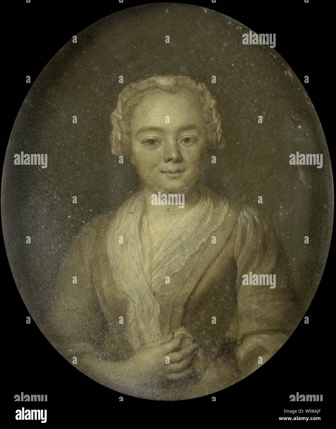 Portrait of Margaretha van Leuvenigh, Wife or Bernardus de Bosch, Portrait of Margaretha van Leuvenigh (1705-85), wife of Bernardus de Bosch. Half in one oval, the right hand in front of the belly., Jan Maurits Quinkhard, 1743, copper (metal), oil paint (paint), h 11 cm × w 9.5 cm h 20.5 cm × w 17.7 cm × d 2 cm Stock Photo