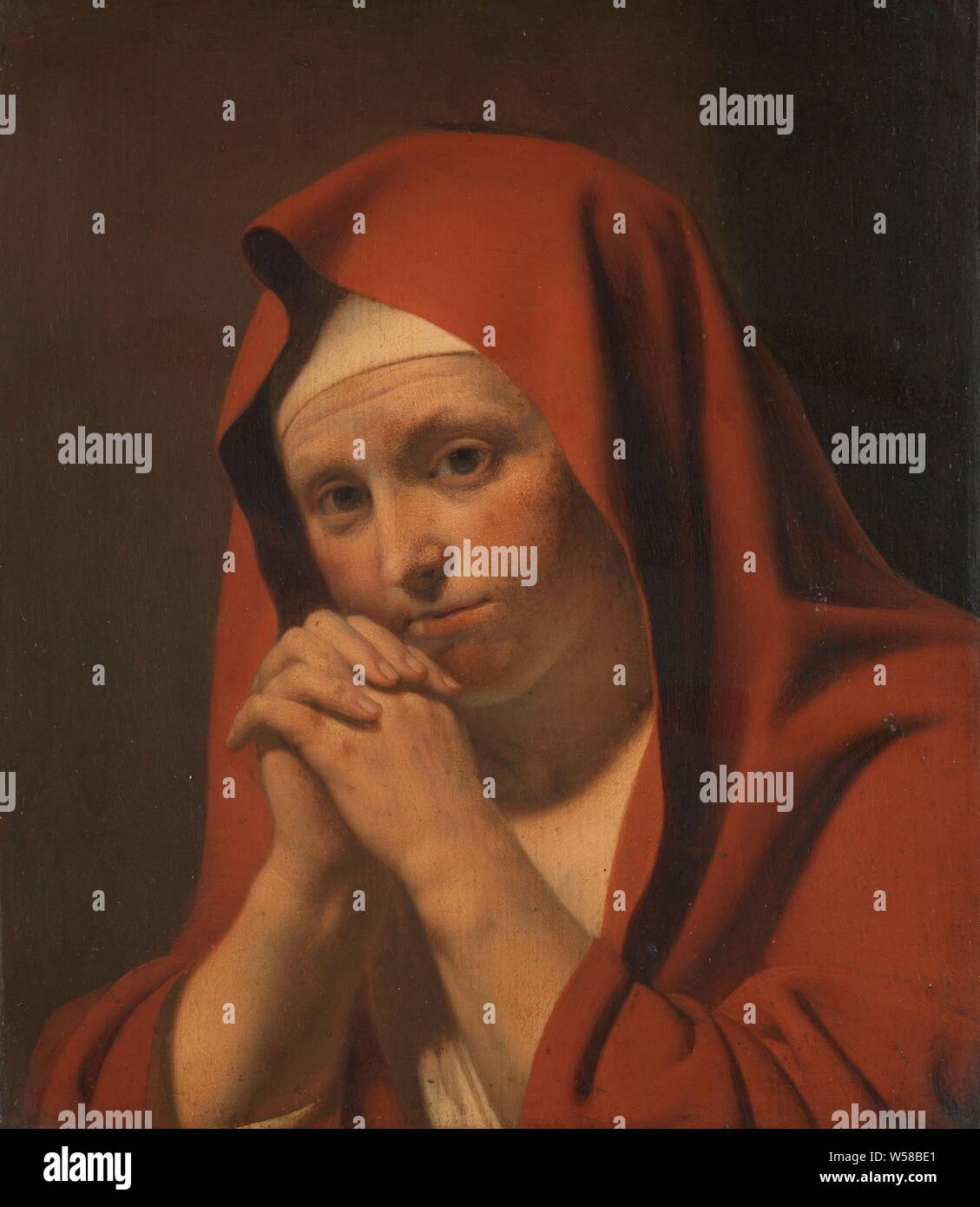 Woman Praying, A praying woman, hands folded in front of the face., Caesar Boetius van Everdingen (circle of), 1640 - 1671, panel, oil paint (paint), support: h 32.2 cm × w 28.2 cm d 8.3 cm Stock Photo