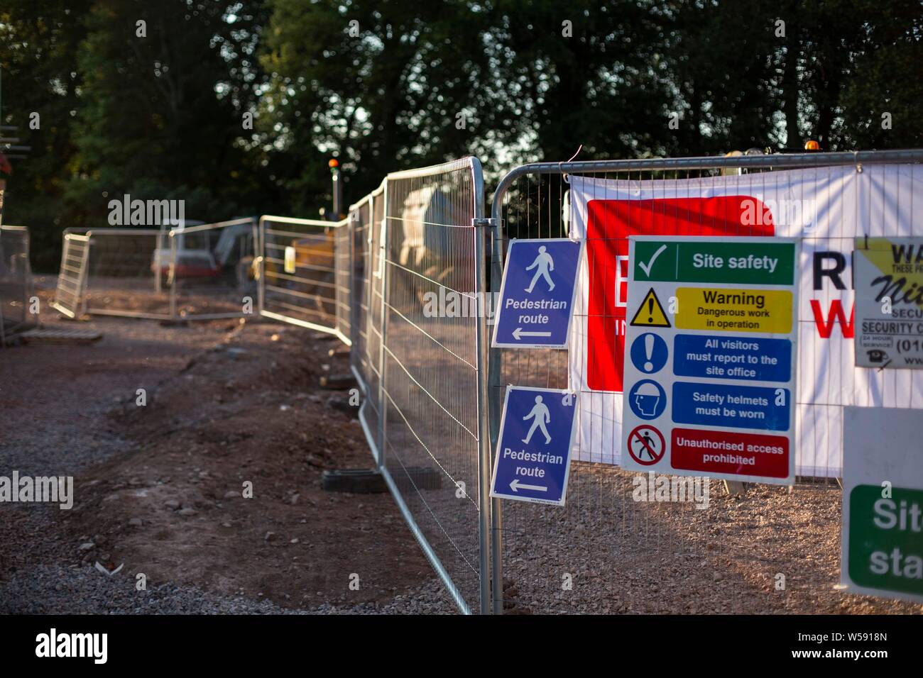 A pedestrian route sign through a building site in Cardiff, July 2019 ...