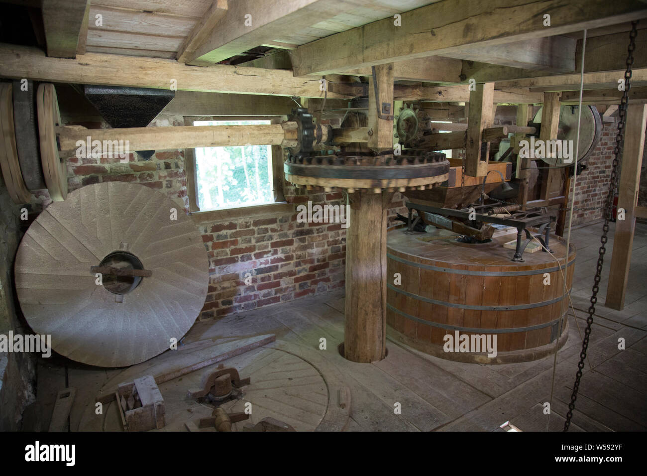 Flour grinding machinery in a 19th century water mill, Sussex, England Stock Photo