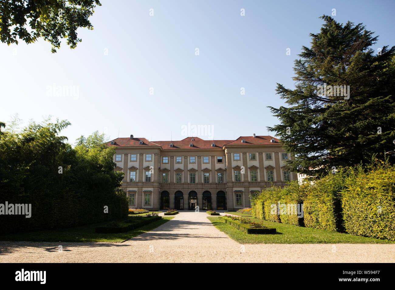 The back of the Liechtenstein Garden Palace with its formal garden in Vienna, Austria. Stock Photo