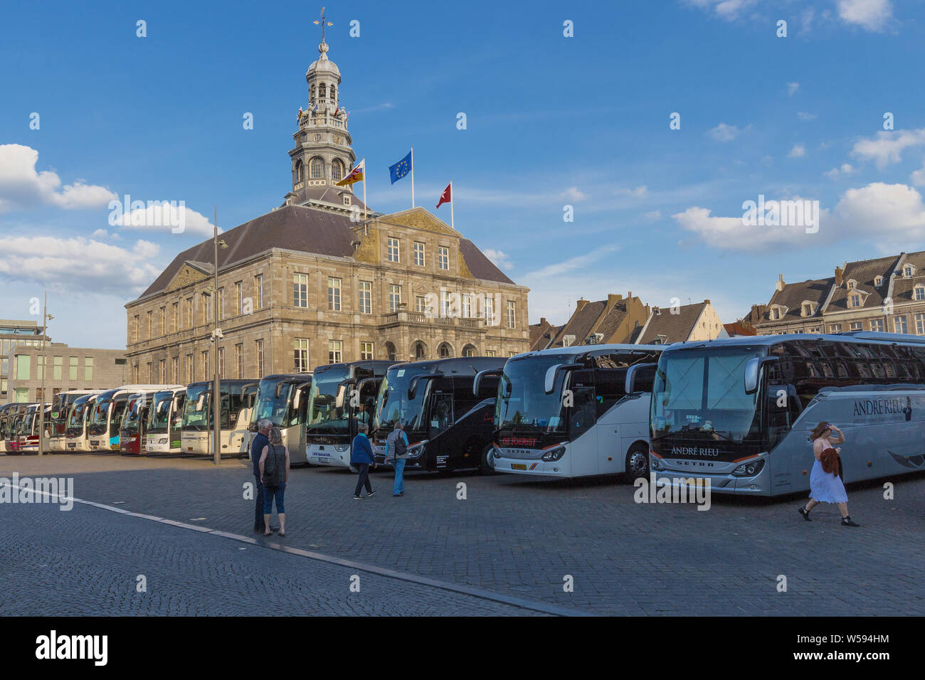 Touring cars parked on the Market square in downtown Maastricht ...