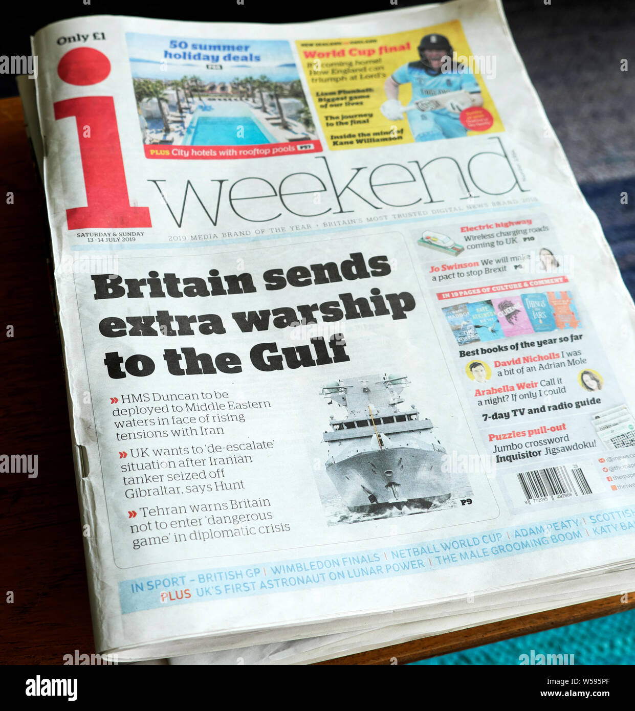 i newspaper headline 'Britain sends extra warship to the Gulf' on front page London England UK Stock Photo
