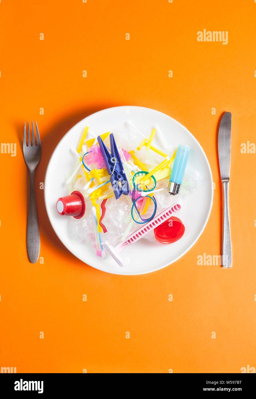 Conceptual image of plastic pollution entering the food chain. Stock Photo