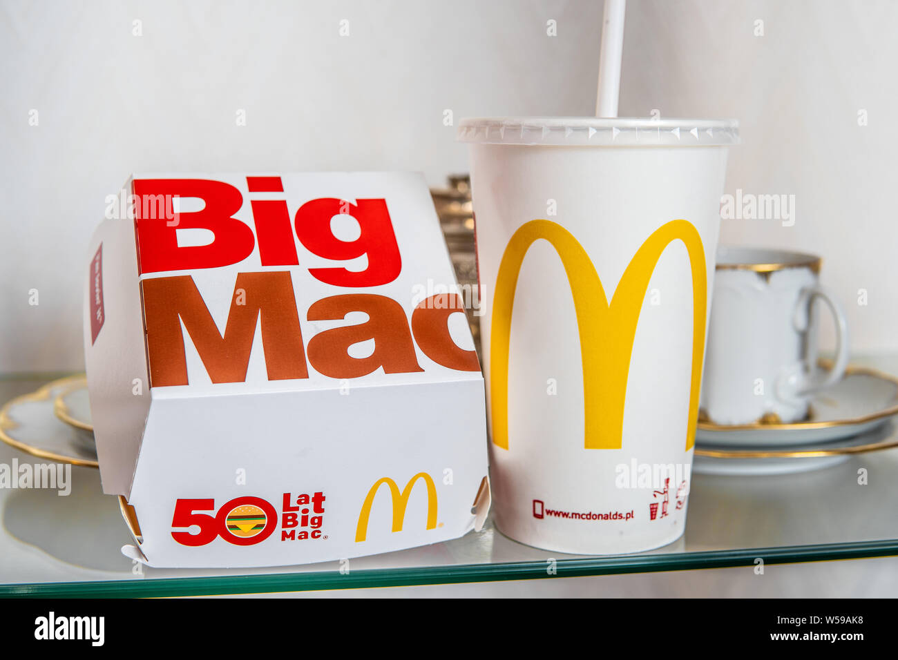 Warsaw, Poland, July 2018 McDonald's Big Mac 100% pure beef sandwiched with  refreshing Coca-Cola Coke, big yellow McDonald's M sign, logo on cup Stock  Photo - Alamy