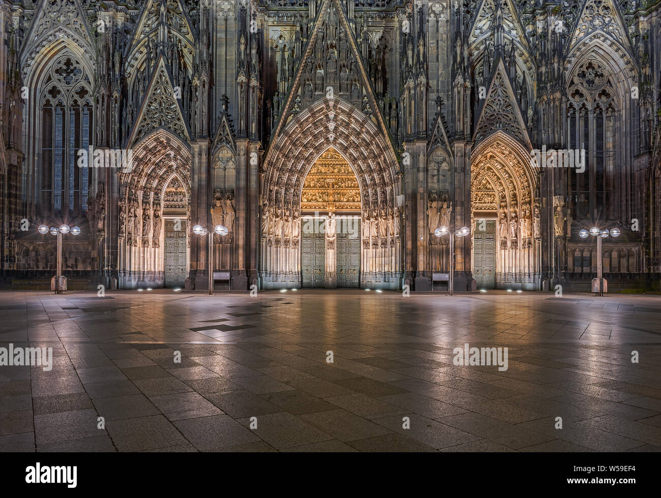 Cologne Cathedral Entrance at Night Stock Photo