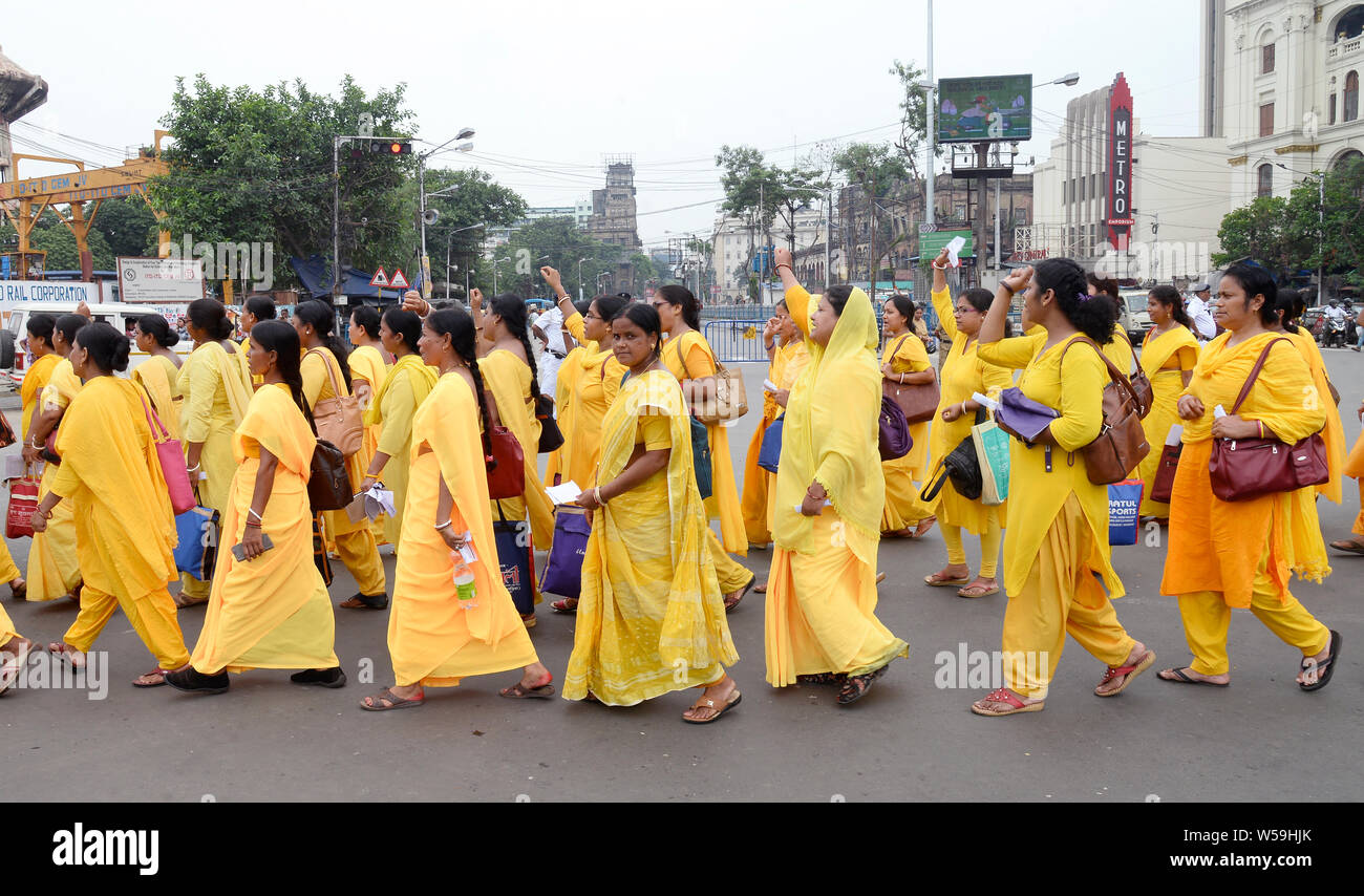 Kolkata, India. 26th July, 2019. Nurses of United Auxiliary Nurse (2nd ANM - R) Employees Association take part in a rally for their five demands. Credit: Saikat Paul/Pacific Press/Alamy Live News Stock Photo