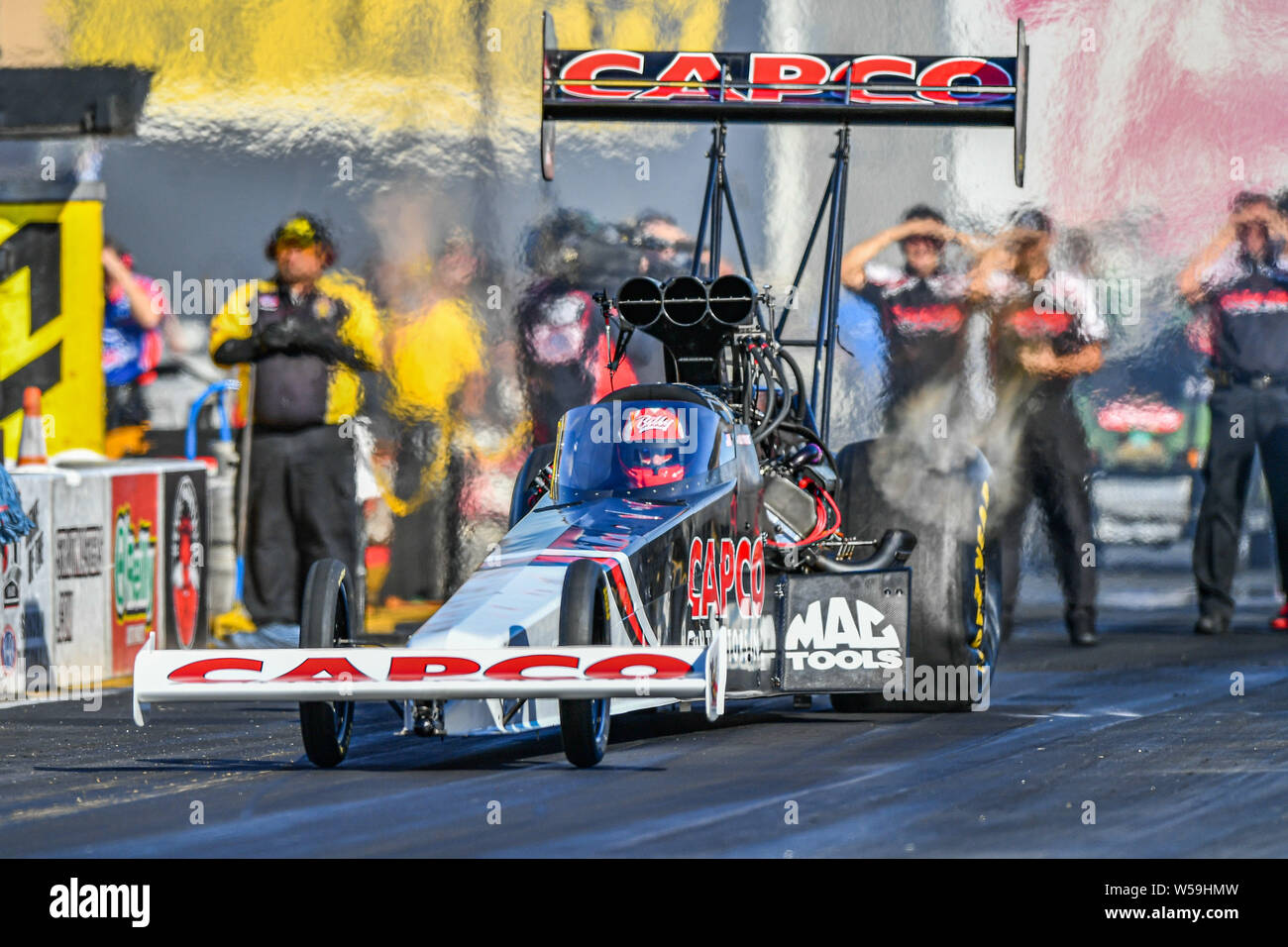 Sonoma, California, USA. 26th July, 2019. Bill Torrence launches his top fuel dragster during the NHRA Sonoma Nationals at Sonoma Raceway in Sonoma, California. Chris Brown/CSM/Alamy Live News Stock Photo