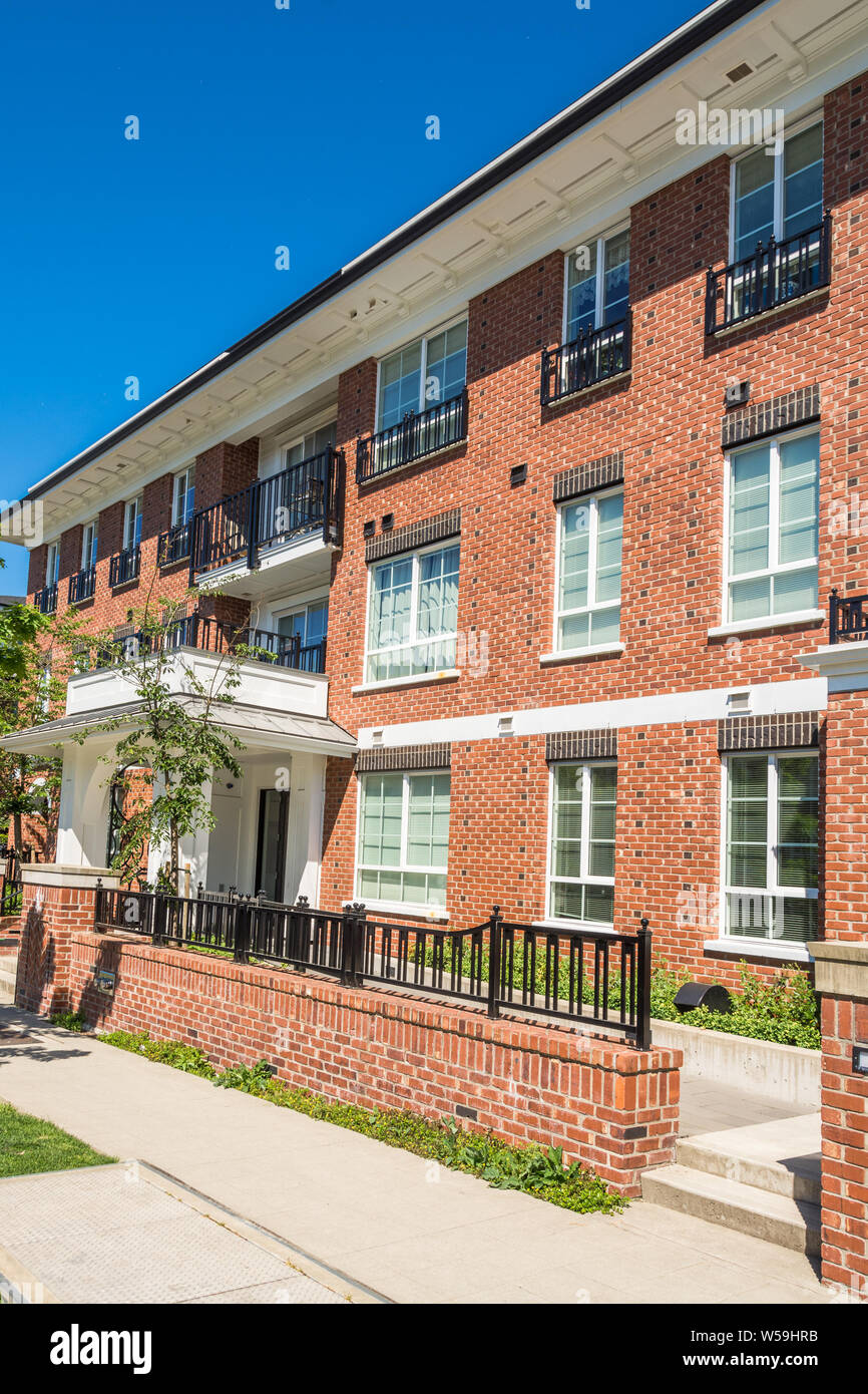 View of Luxury apartment building with concrete pathway in front Stock Photo ...