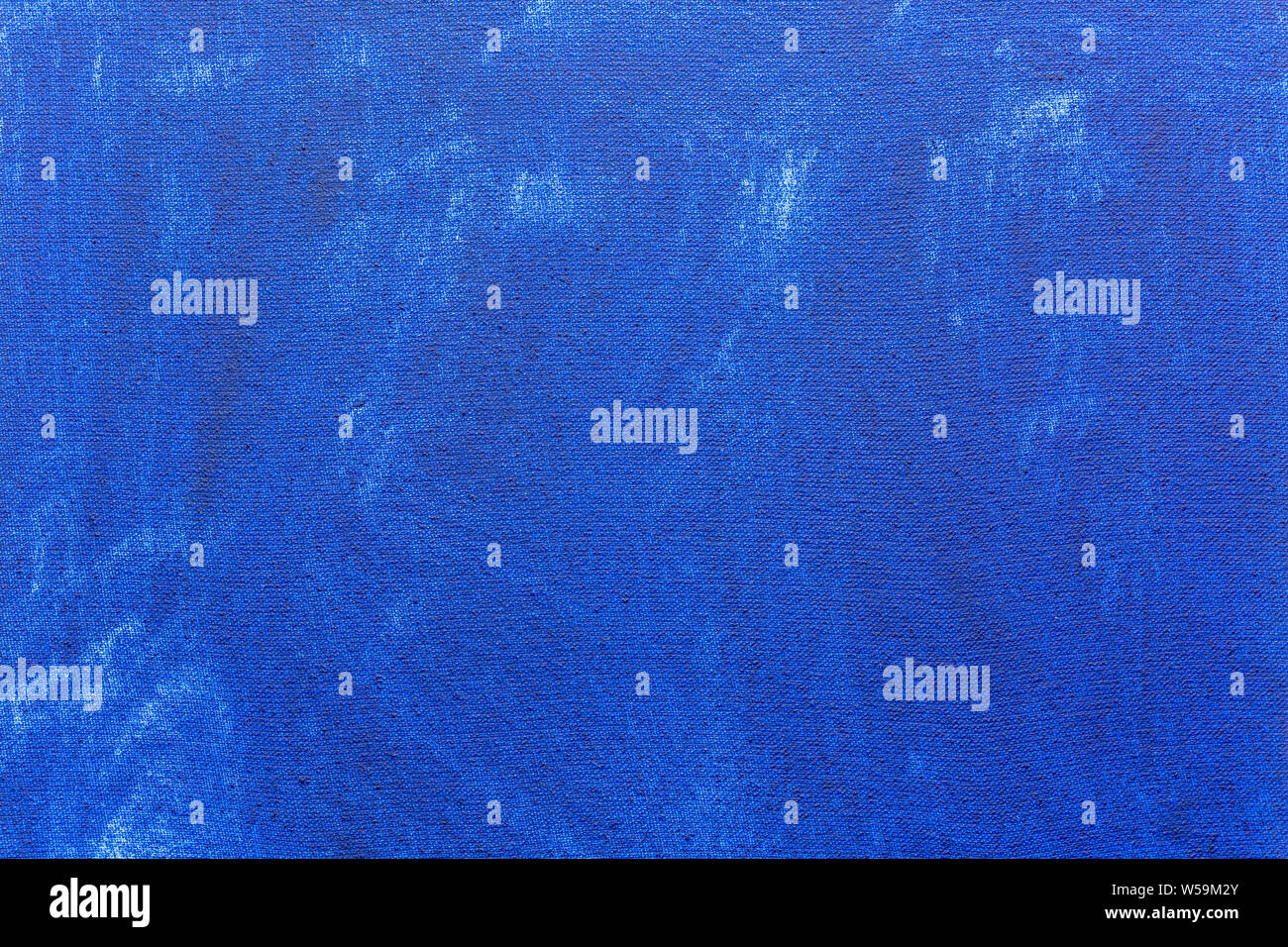 Abstract grunge painted background. Background was painted with blue egg tempera on canvas by hand. Stock Photo