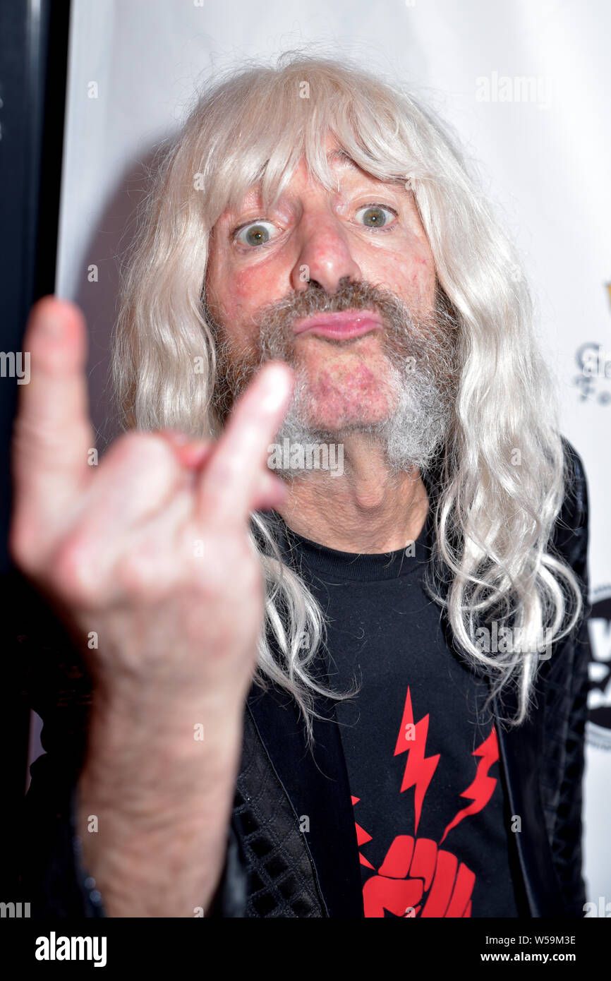 LActor Harry Shearer attends the California Saga 2 Benefit as his character Derek Smalls from the film This is Spinal Tap at Ace Hotel on July 03, 201 Stock Photo